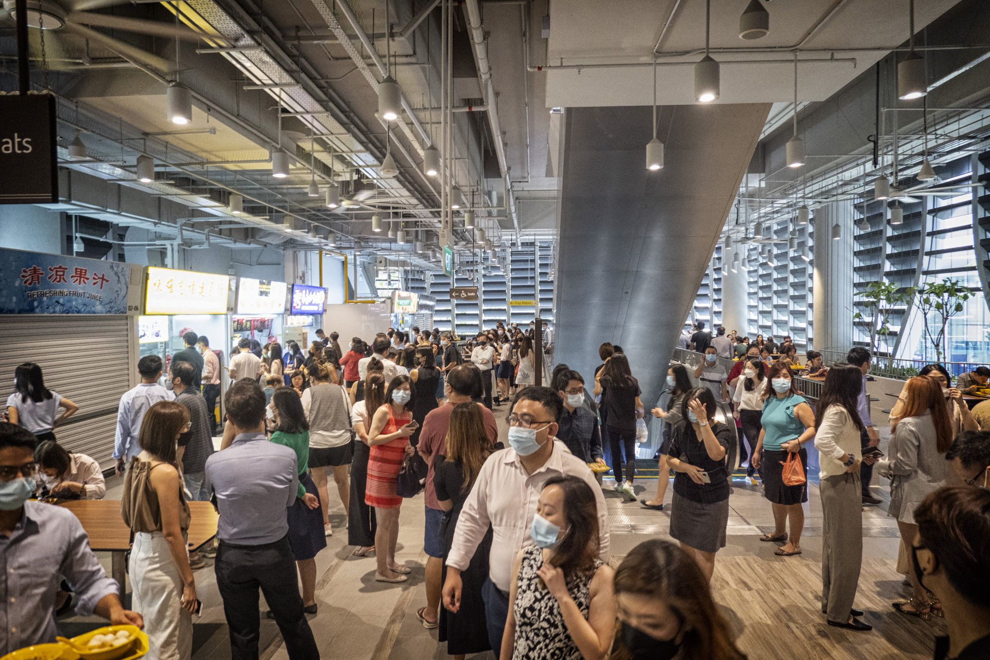 Customers at Singapore’s Market Street Hawker Centre during a lunch hour in April. Photo: Bloomberg