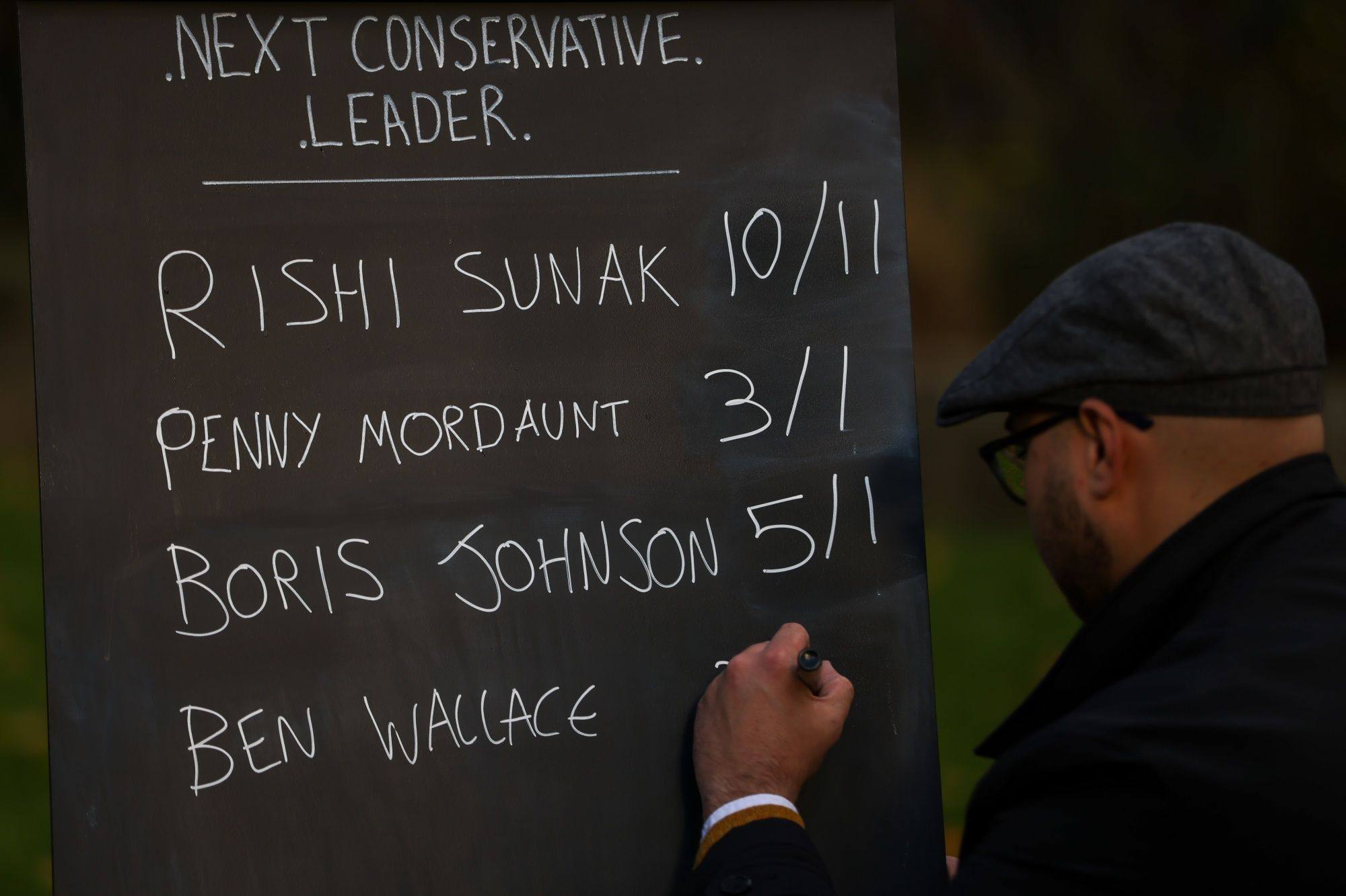 A bookmaker writes the voting odds for the next leader of the Conservative Party. Photo: Bloomberg