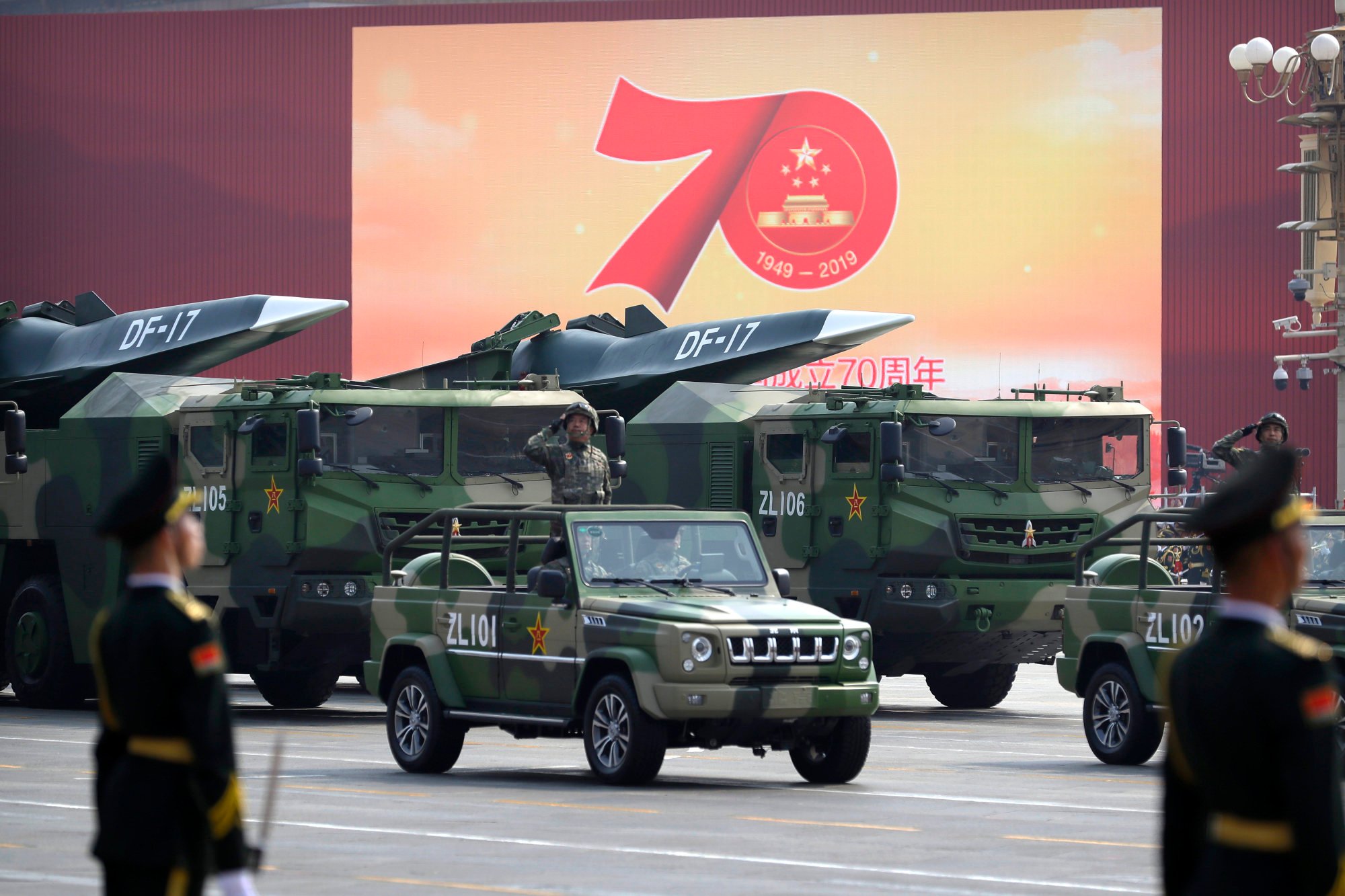 Chinese military vehicles carrying DF-17 ballistic missiles are seen at a parade to commemorate the 70th anniversary of the founding of Communist China, in Beijing on October 1, 2019. Trucks carrying weapons, including a nuclear-armed missile designed to evade US defences, were part of the parade which showcased China’s global ambitions. Photo: AP