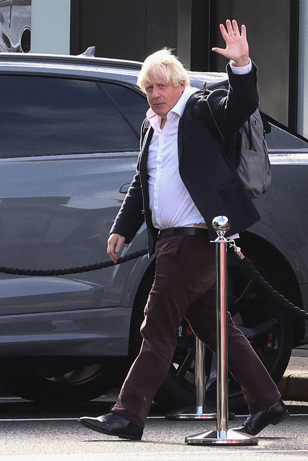 Former British Prime Minister Boris Johnson at Gatwick Airport after returning from his holiday. Photo: Reuters