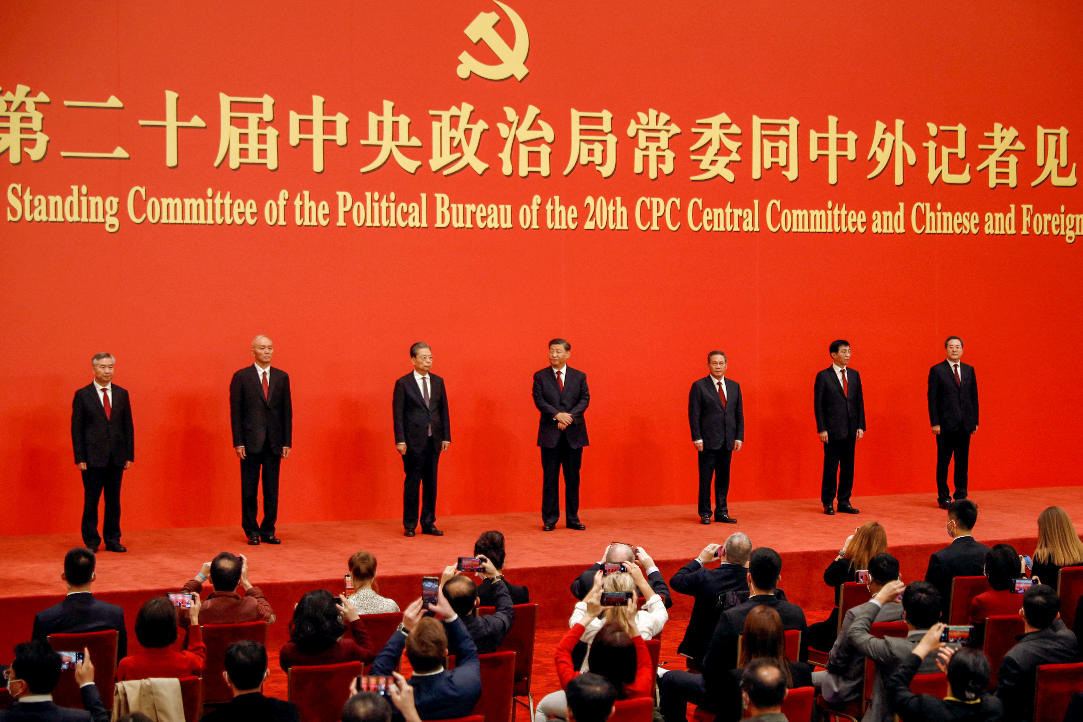 Xi Jinping pictured with members of the new Politburo Standing Committee on Sunday. Photo: Reuters