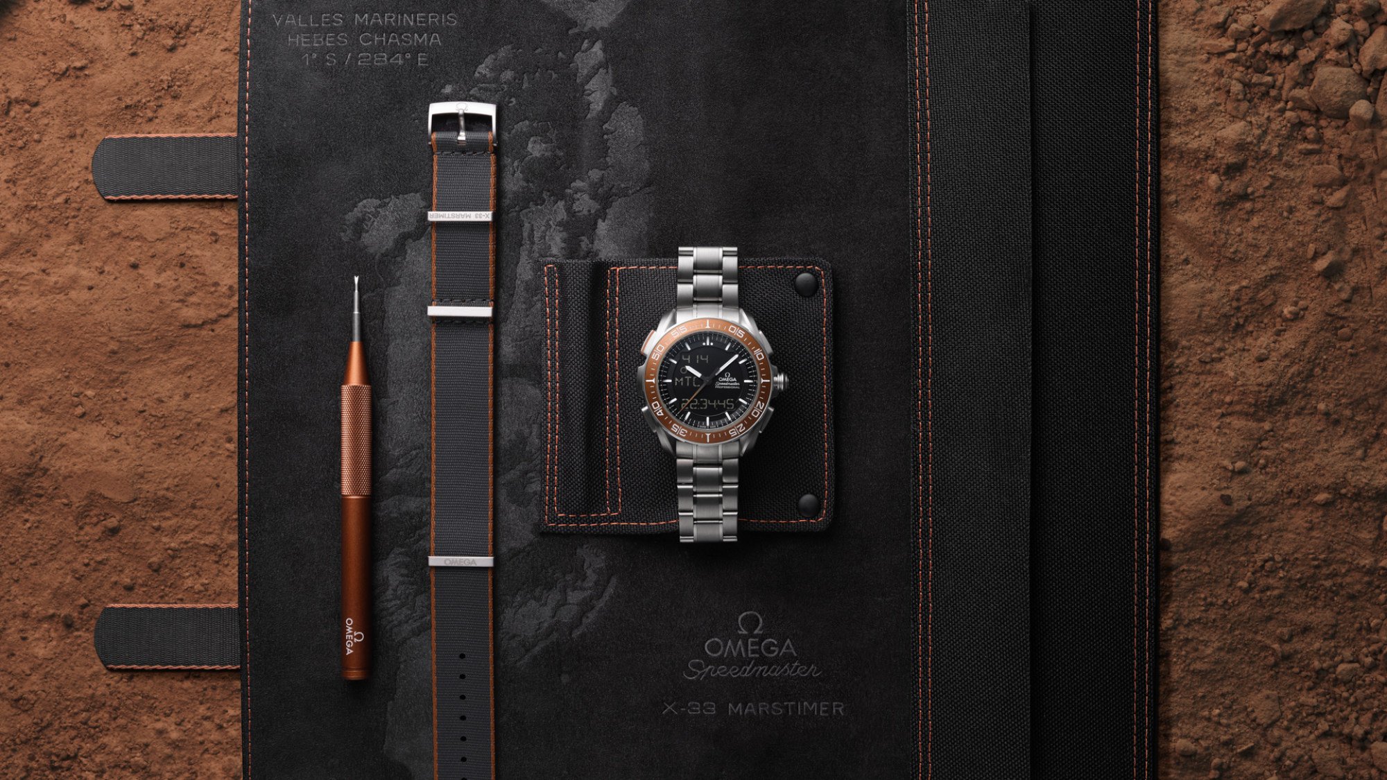 The Speedmaster X-33 Marstimer comes with a Nato strap and a strap changing tool in the watch roll, which nods to the red planet on its inner lining with a reproduction of Hebes Chasma – a canyon on the surface of Mars.