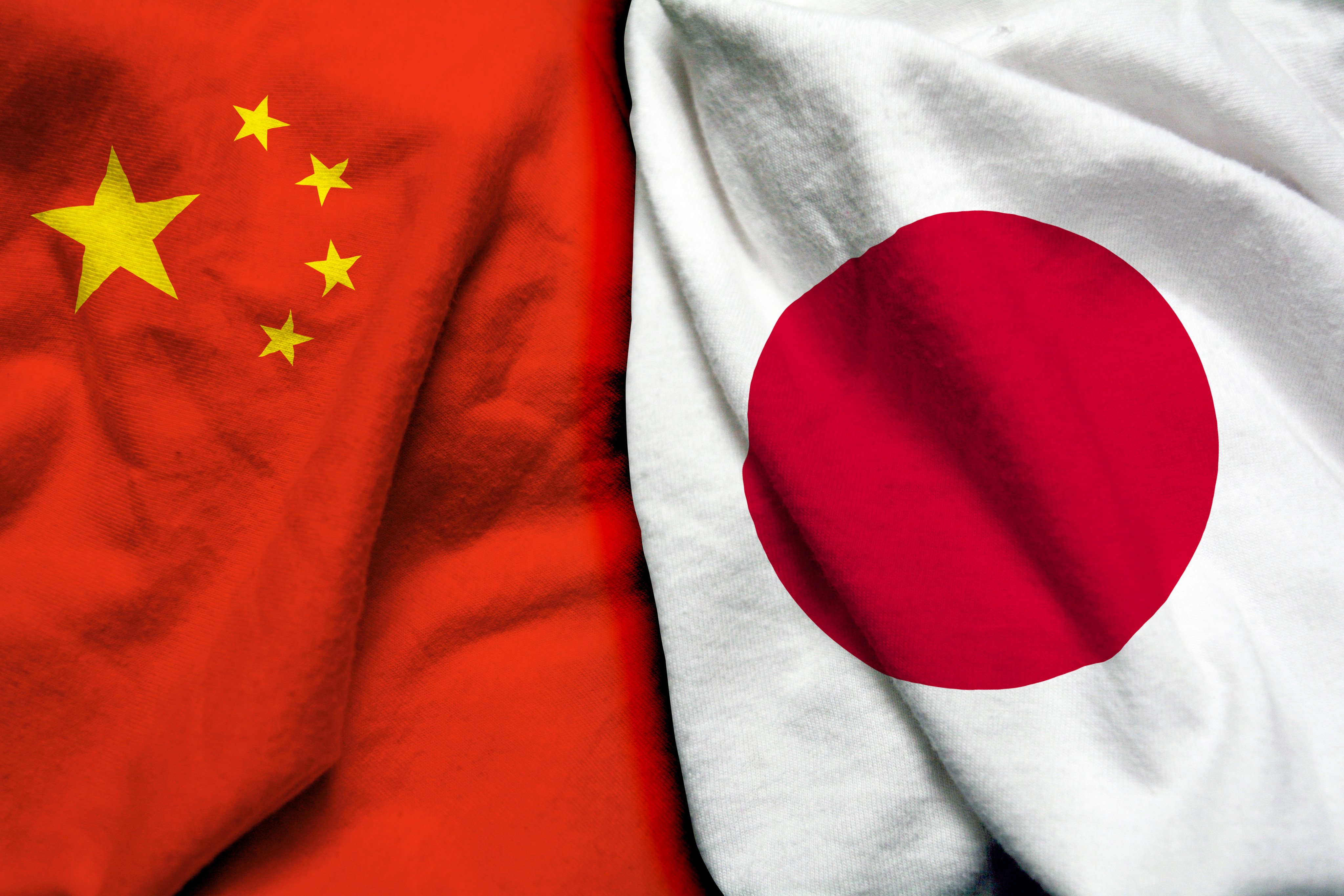 Flags of China and Japan. Photo: Shutterstock/File