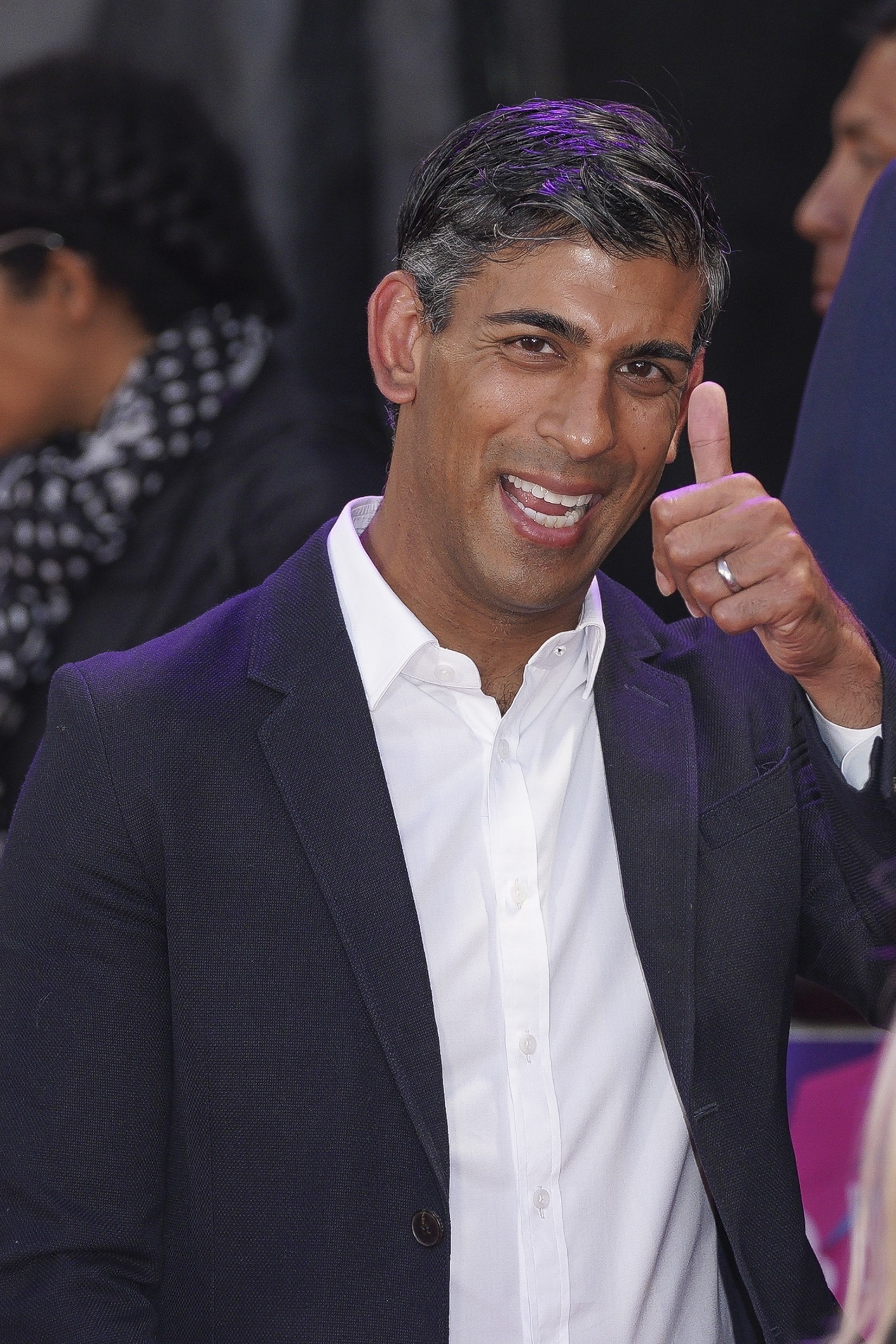Rishi Sunak poses for photographers upon arriving at an event in London on October 5. Photo: AP