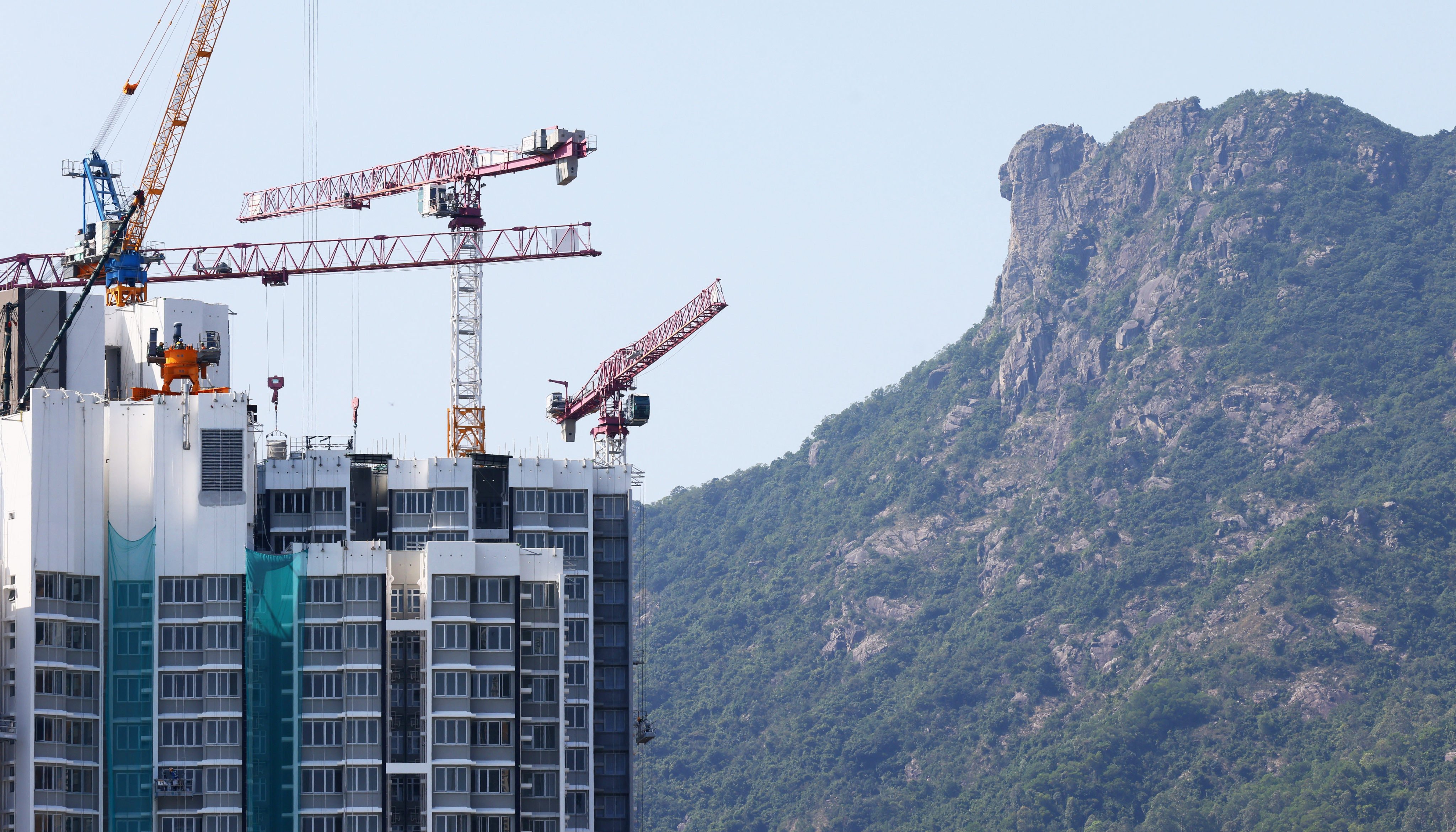 Flats under construction, with Lion Rock in the background, on October 11. Photo: Dickson Lee