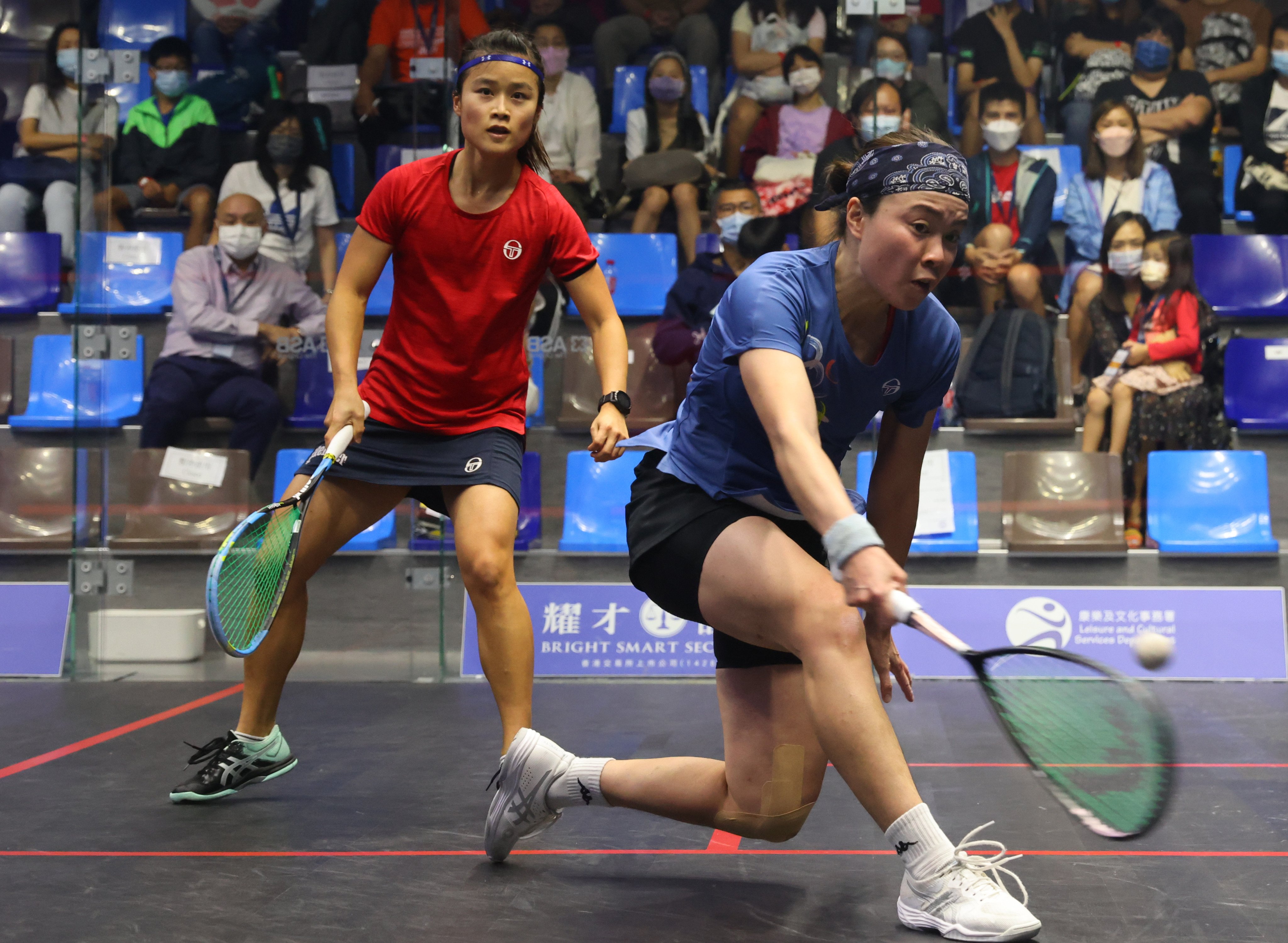Tong Tsz-wing (right) takes on Lee Ka-yi during the final of Hong Kong Squash Championships. Photo: Dickson Lee
