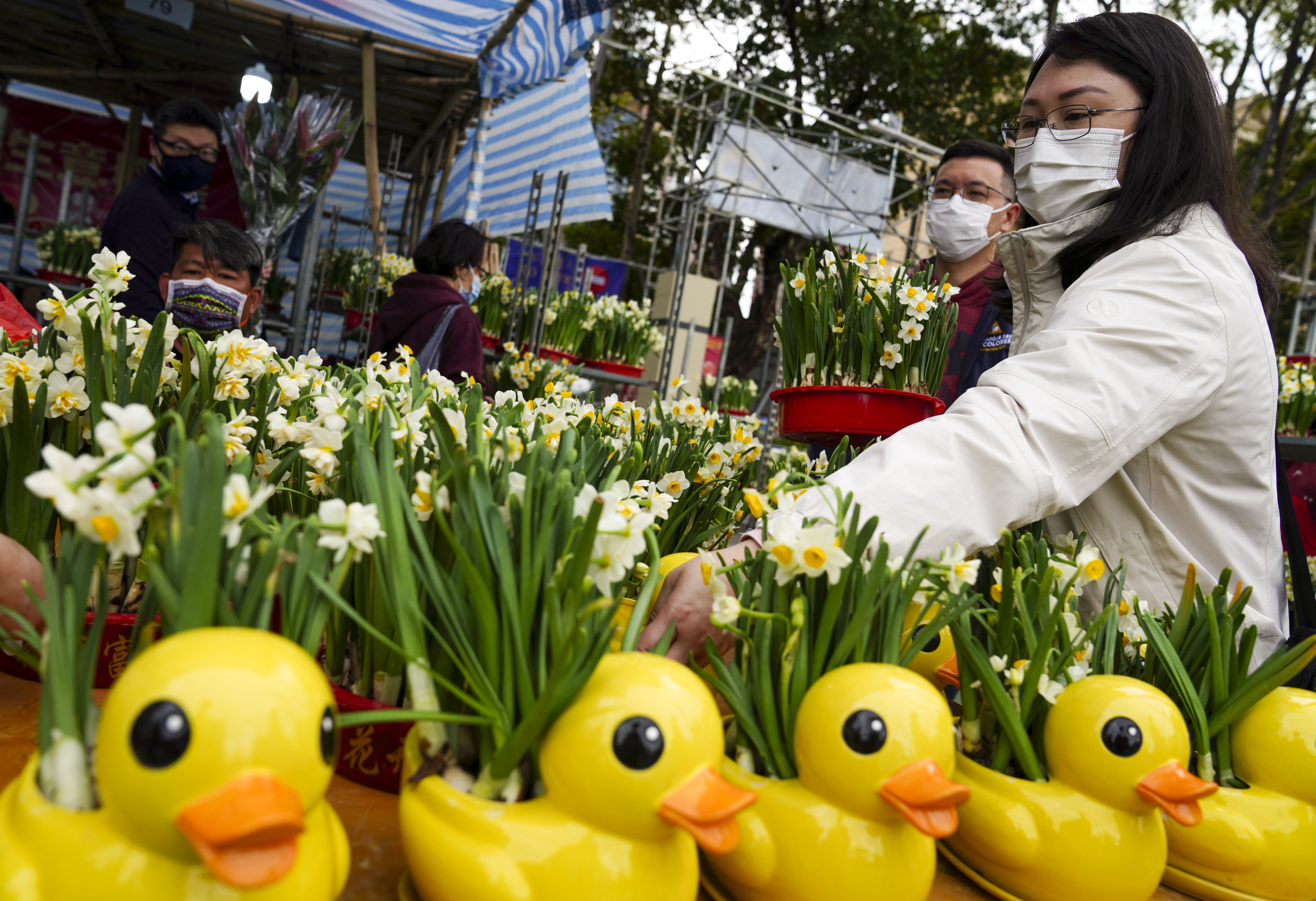 Customers visit the Lunar New Year flower market at Victoria Park in Causeway Bay, amid the Covid-19 crowd-control measures in 2021. Photo: Sam Tsang
