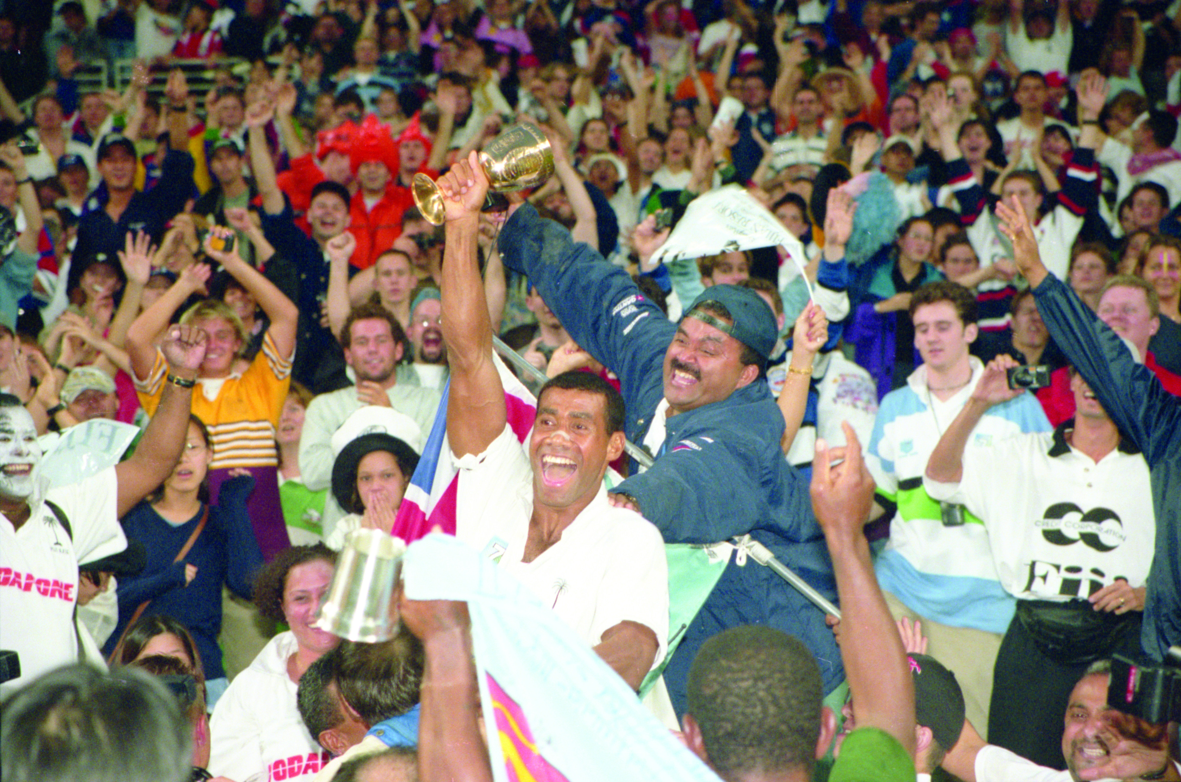 Waisale Serevi holds the Melrose Cup as Fiji are crowned World Cup Sevens champions in Hong Kong in 1997. Photo: SCMP