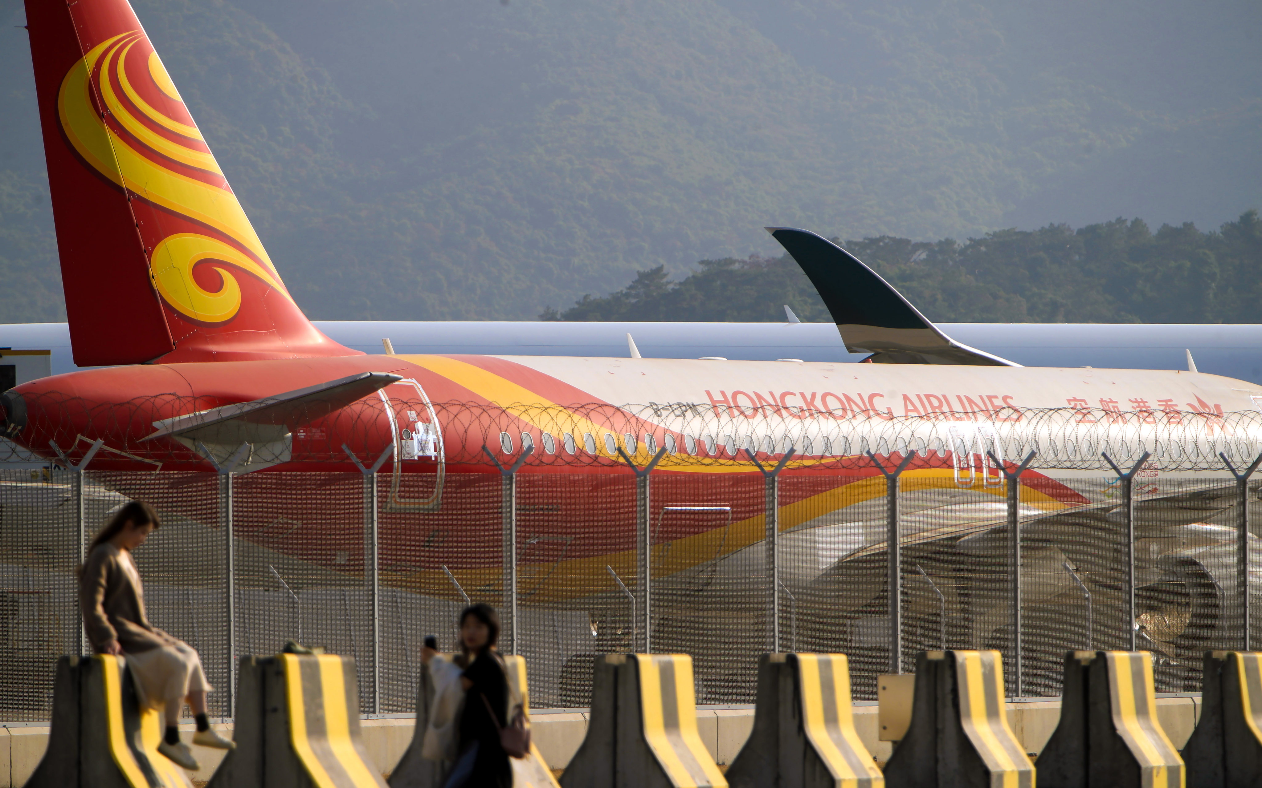 A Hong Kong Airlines A320 passenger aircraft on the tarmac with its jet engines removed, at the Hong Kong International Airport. Photo: Winson Wong