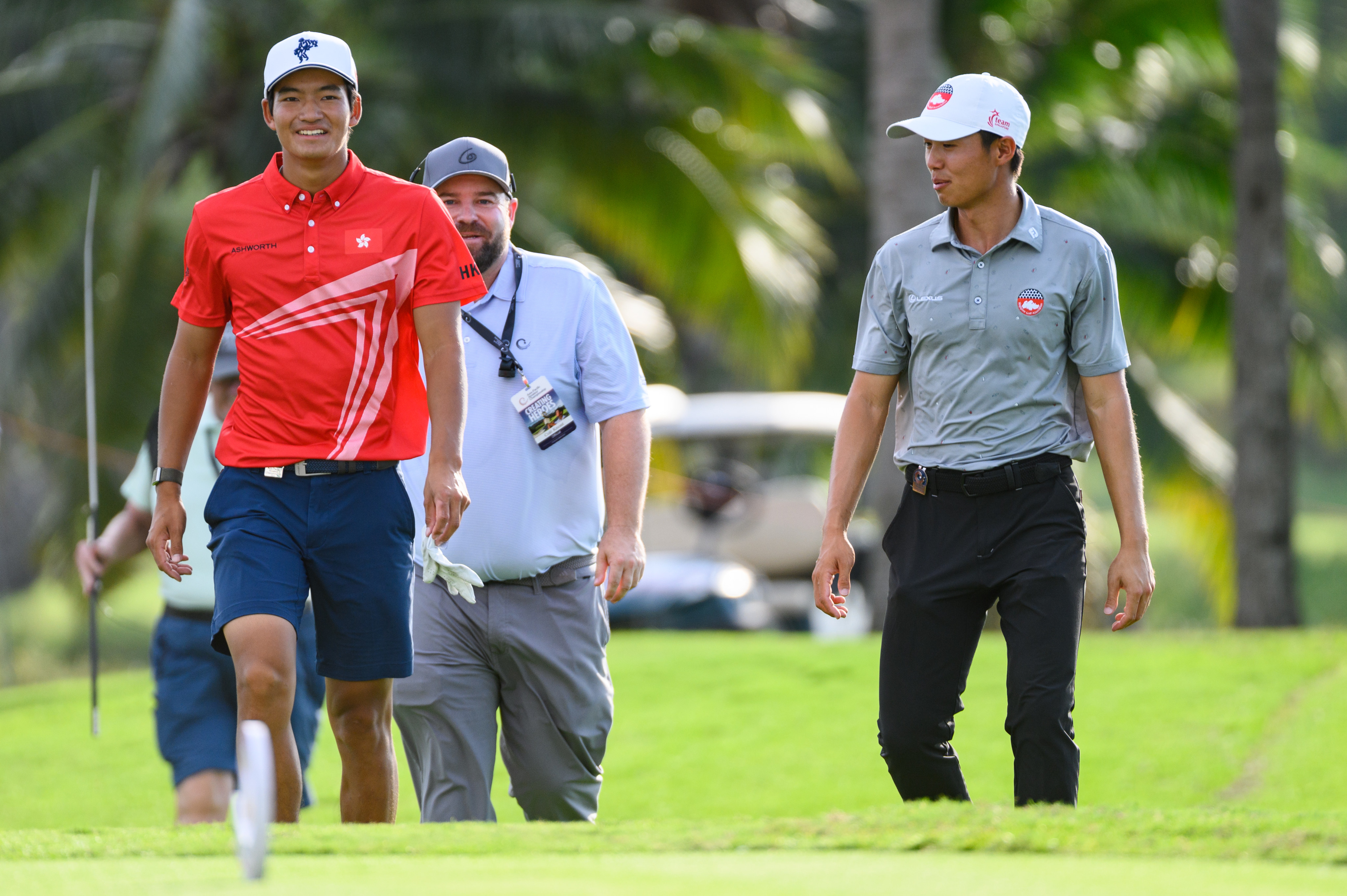 Taichi Kho and James Leow share a joke during the second round of the 2022 Asia-Pacific Amateur Championship. Photo: AAC