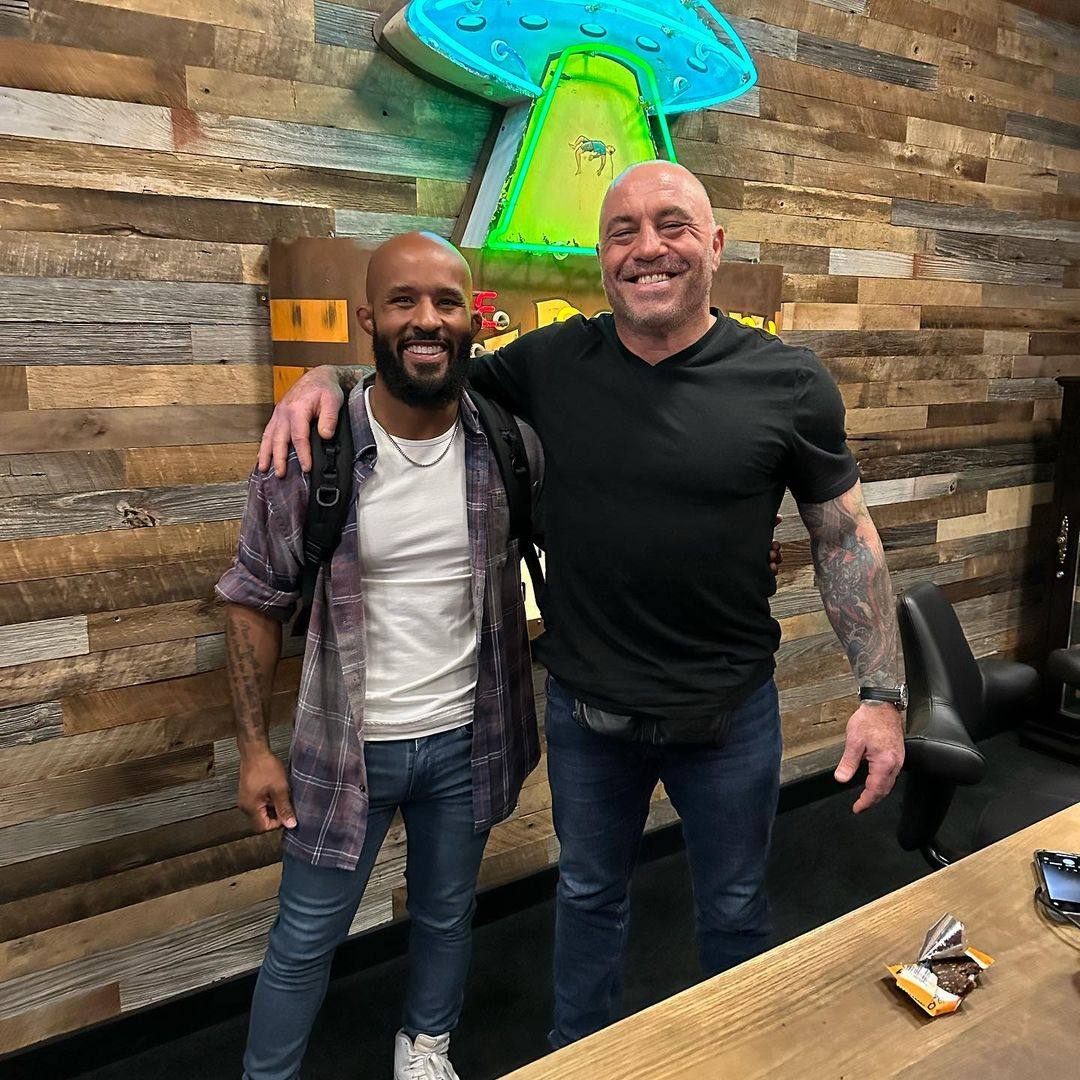 Demetrious Johnson poses for a photo with Joe Rogan ahead of his appearance on the UFC commentator’s podcast. Photo: Instagra/@mighty