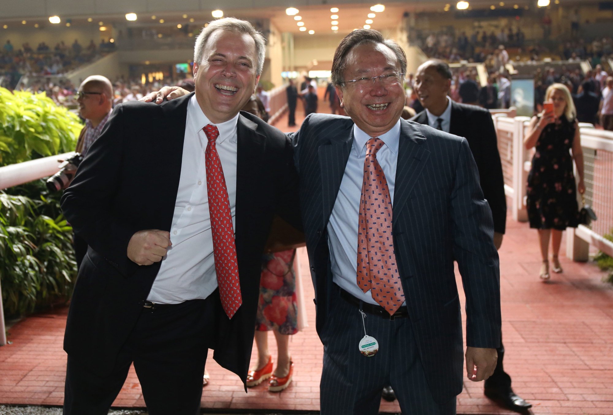 Owner Boniface Ho (right) celebrates Southern Legend’s 2018 Kranji Mile win with trainer Caspar Fownes.