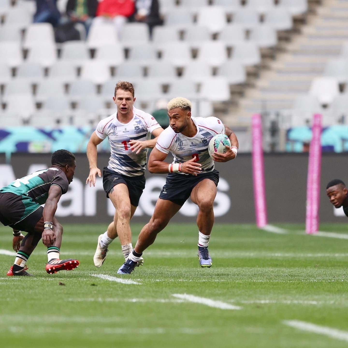Max Denmark takes on the Zimbabwe defence at the Rugby World Cup Sevens. Photo: Handout