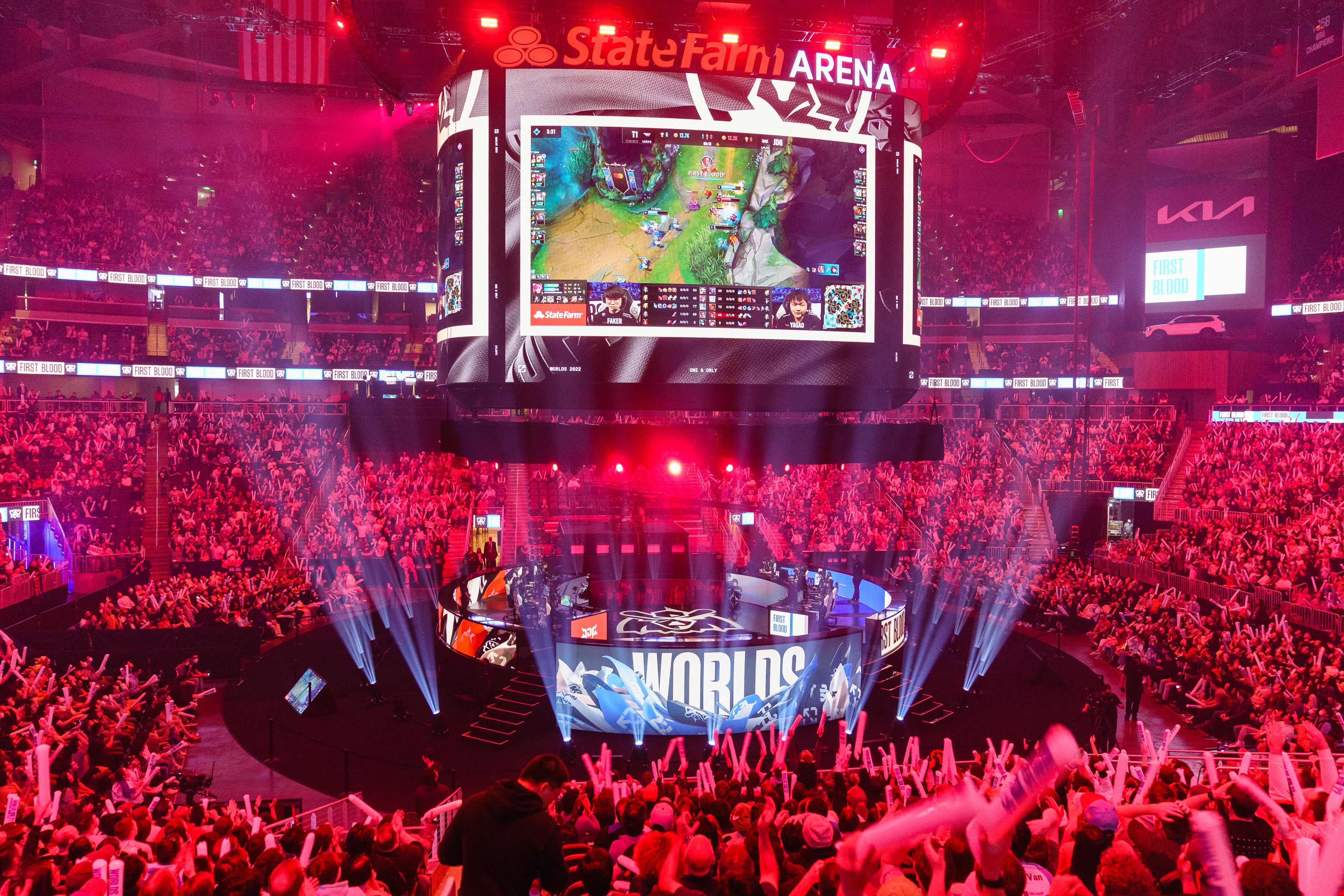 Fans wave inflatable batons during the League of Legends World Championship semi-final match between JD Gaming and T1 at State Farm Arena in Atlanta, Georgia on October 29, 2022. Photo: Agence France-Presse