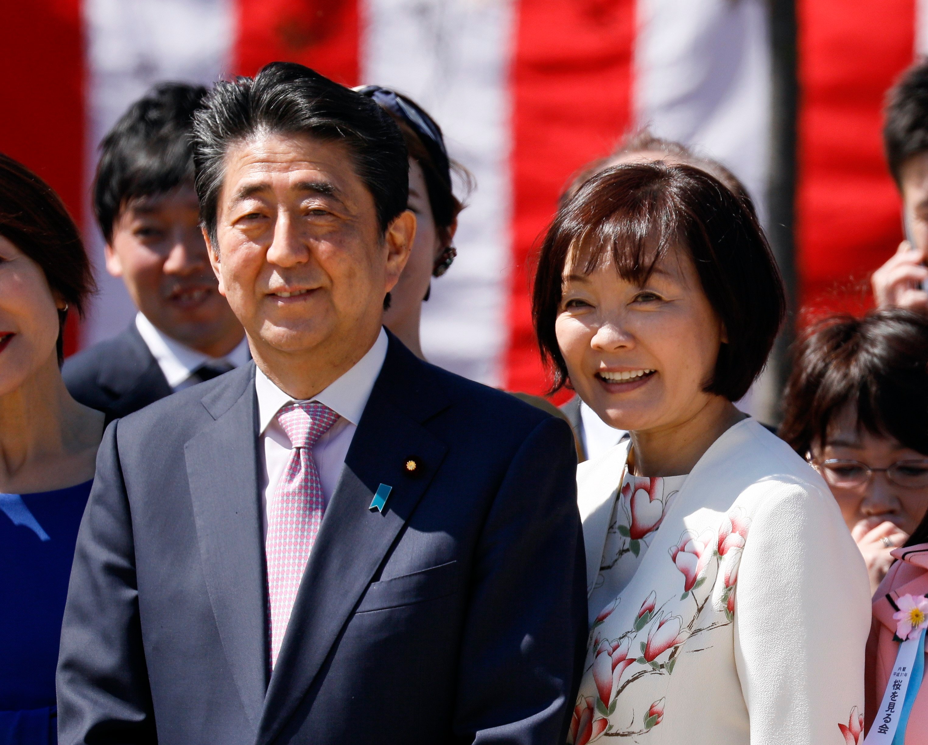 Late Japanese Prime Minister Shinzo Abe (L) and his wife Akie are seen during a cherry blossom viewing party in April 2019. Photo: EPA-EFE/File