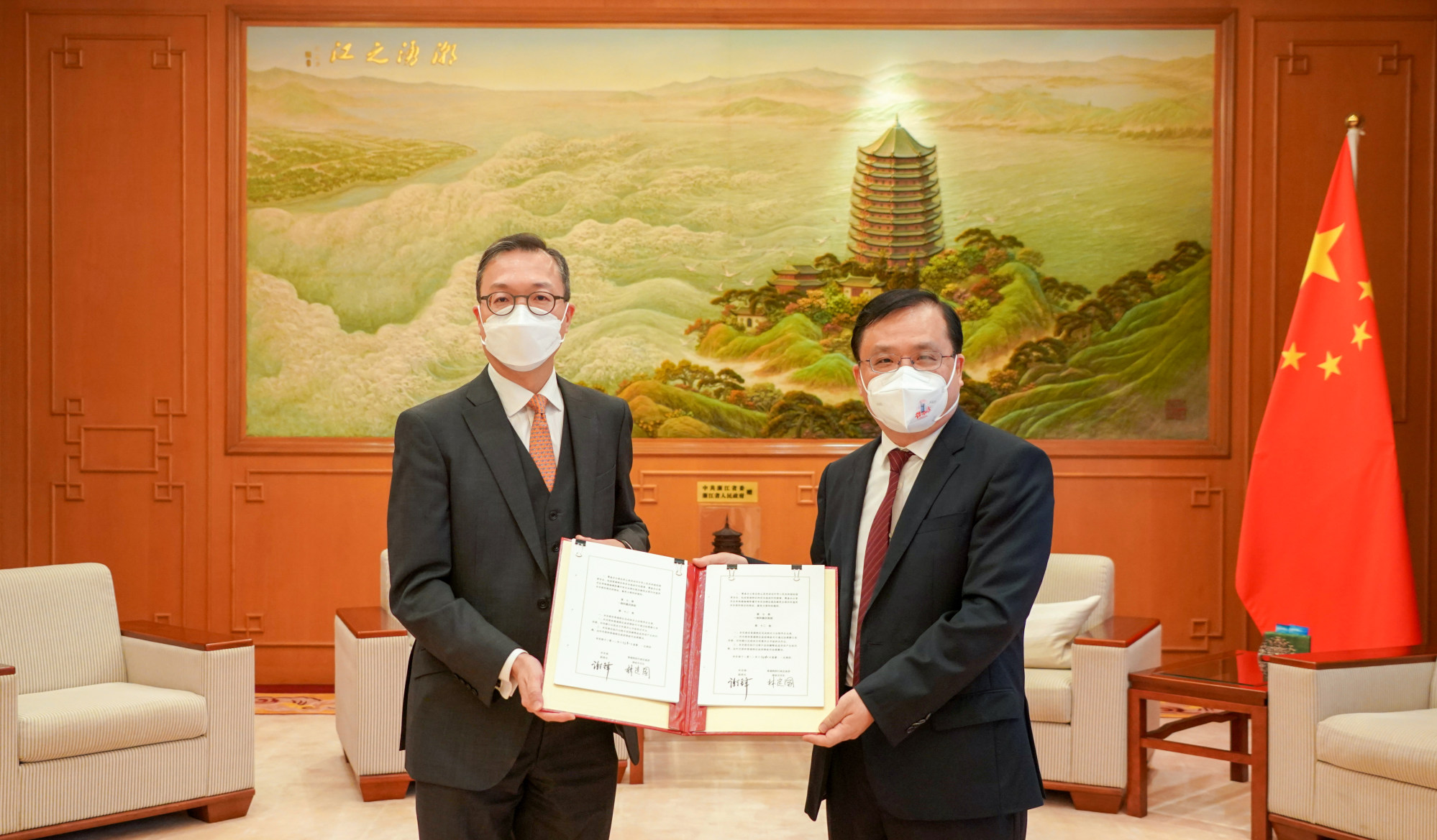 Hong Kong Secretary for Justice Paul Lam and Fang Jianming, a mainland Chinese official, at the signing of the agreement on the preparation office. Photo: Handout