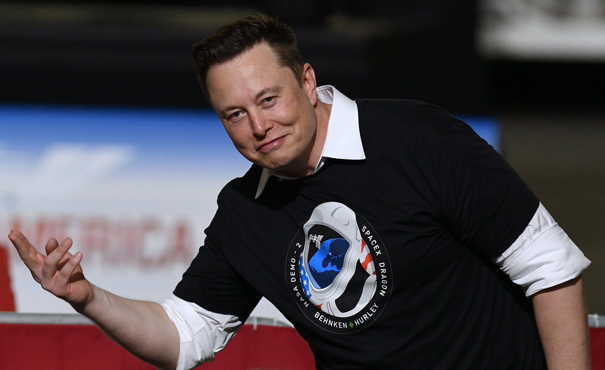 SpaceX CEO Elon Musk celebrates the successful launch of a Falcon 9 rocket at the Kennedy Space Center during a post launch event with former US president Donald Trump and vice-president Mike Pence. Photo: DPA