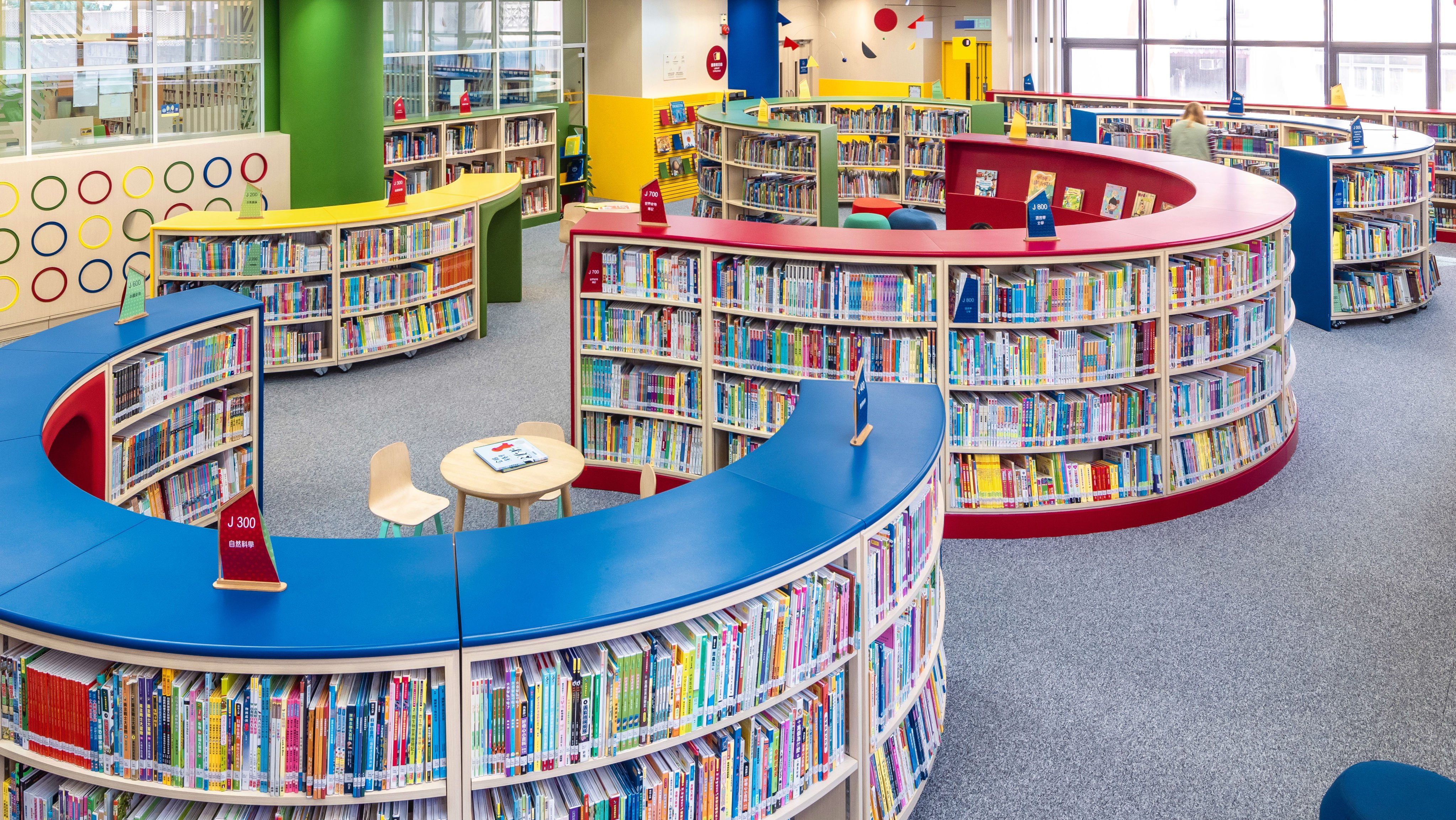 The redesigned children’s section of the library in Aberdeen, Hong Kong, with colourful, movable shelves in a variety of shapes and tunnels for children to explore. Photo: Tugo Cheng Photography