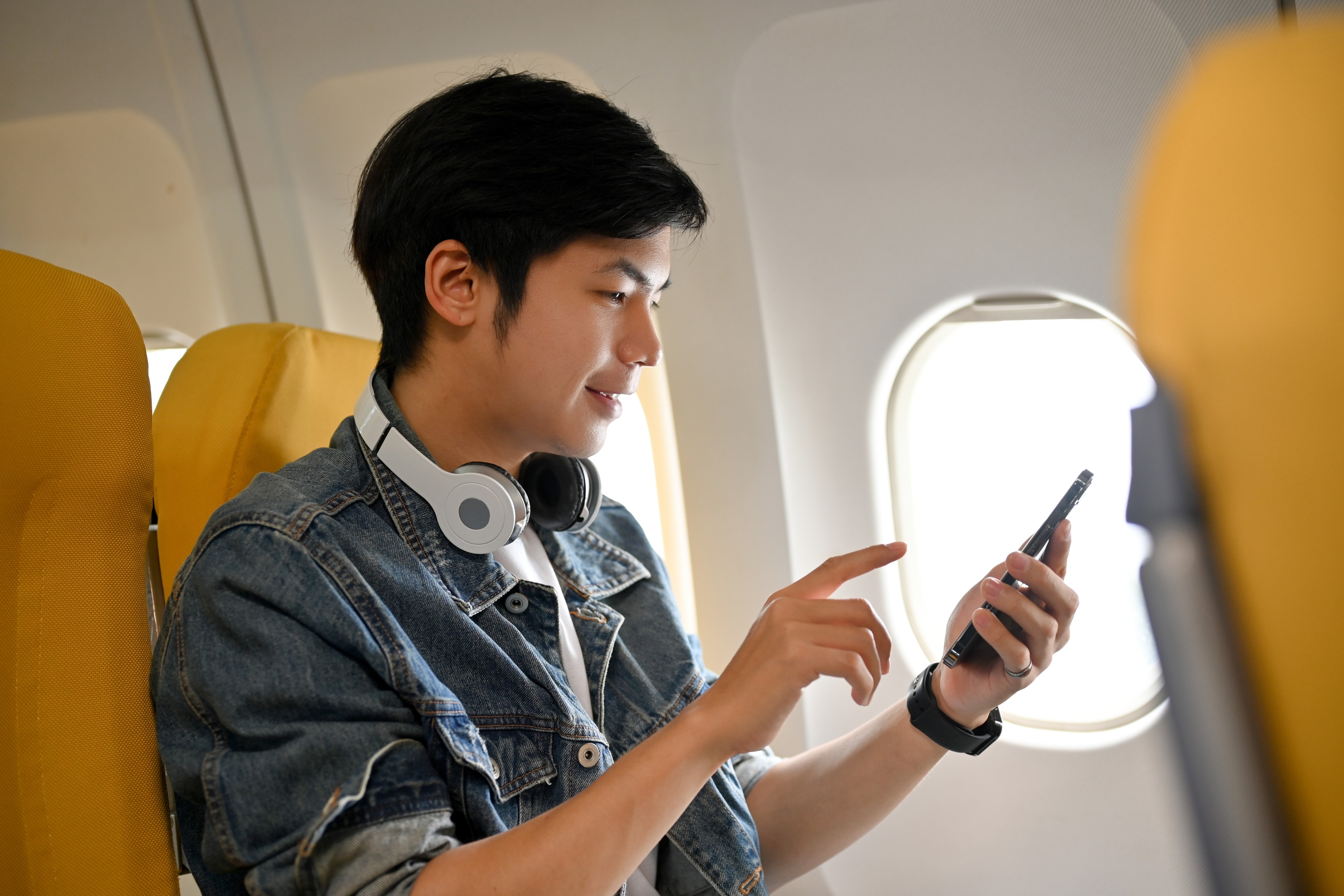 A lot of online flight shopping is done over phones, especially by Generation Z consumers, but the convenience may be offset by higher prices Photo: Shutterstock