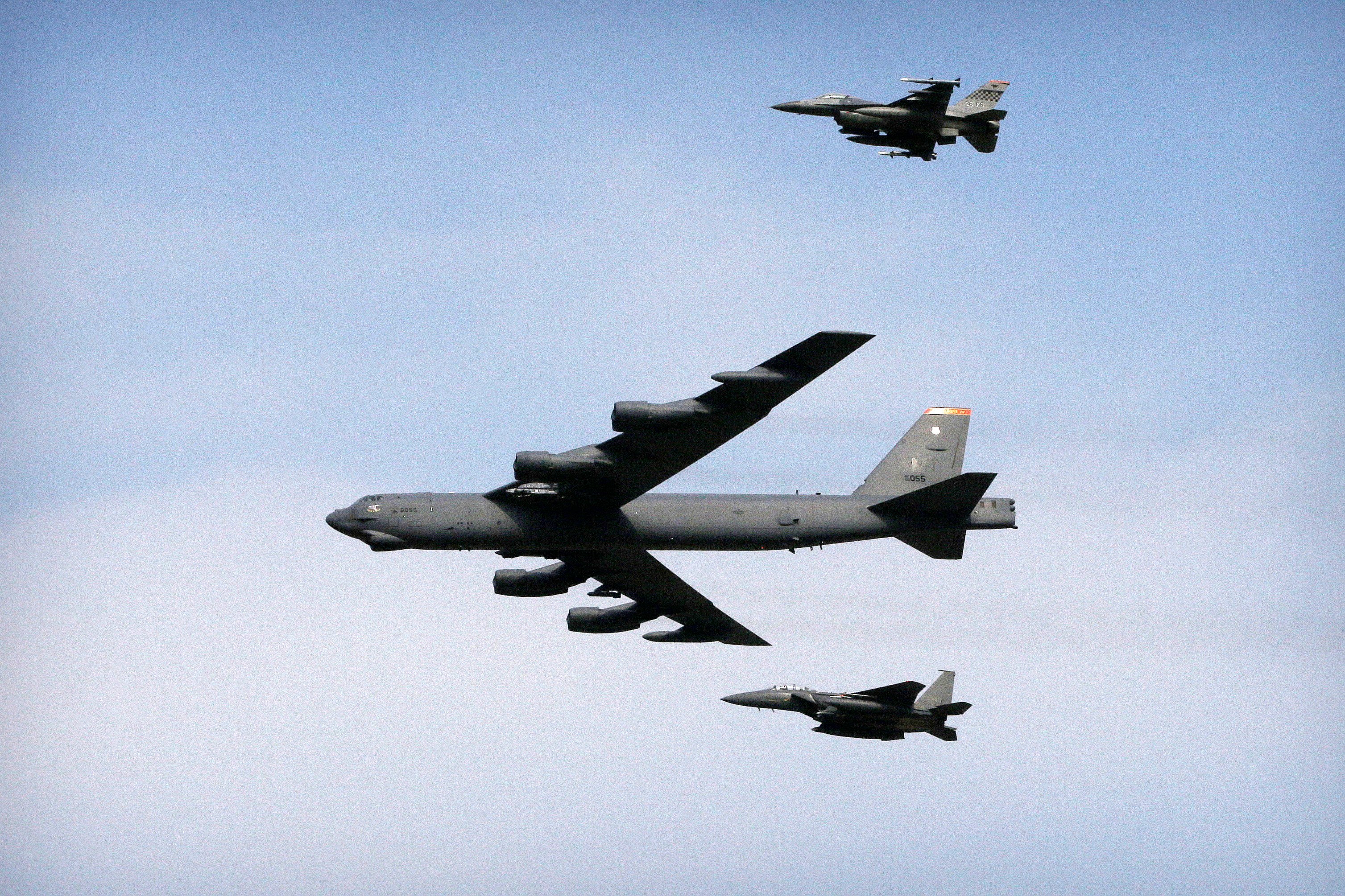 A US Air Force B-52 bomber flies over Osan Air Base in Pyeongtaek, South Korea. The United States is preparing to deploy up to six nuclear-capable B-52 bombers in northern Australia, according to an Australian news report. Photo: AP
