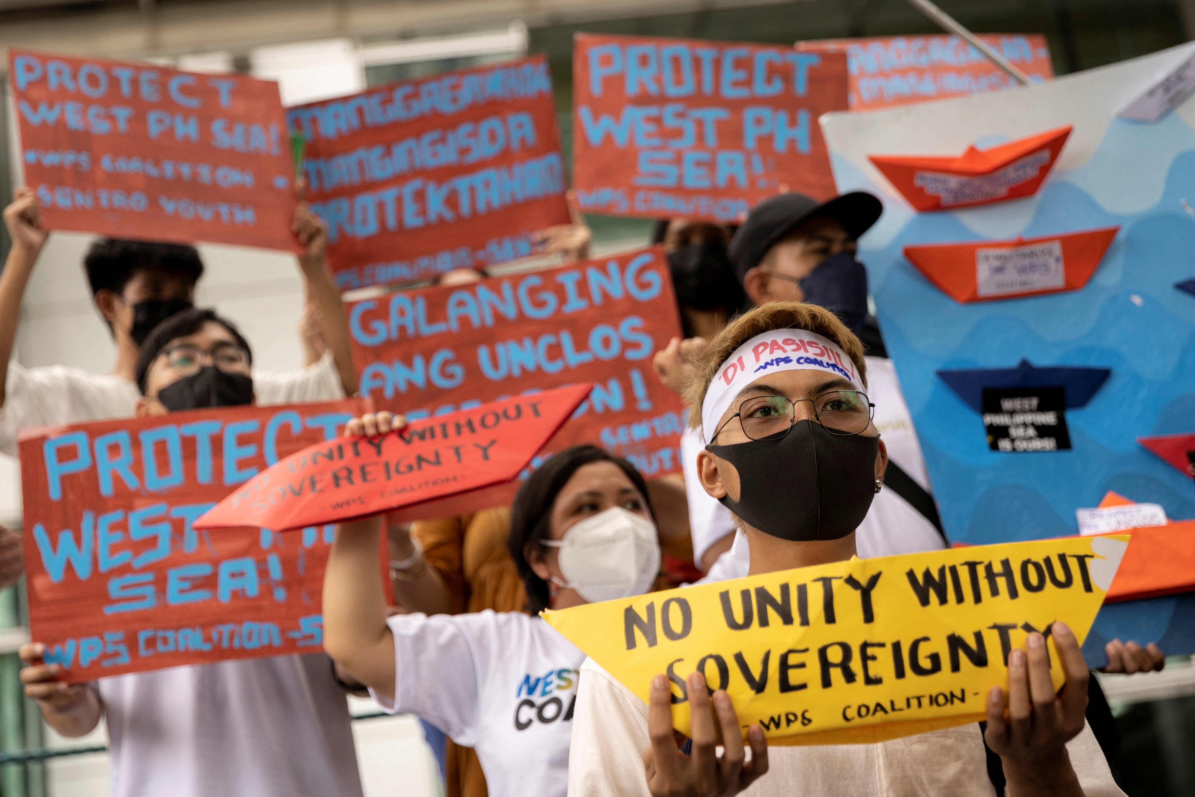Filipino activists stage a protest on the sixth anniversary of an international tribunal ruling that went against China’s historical claims in the South China Sea, outside the Chinese consular office in Makati City, the Philippines, on July 12. Photo: Reuters