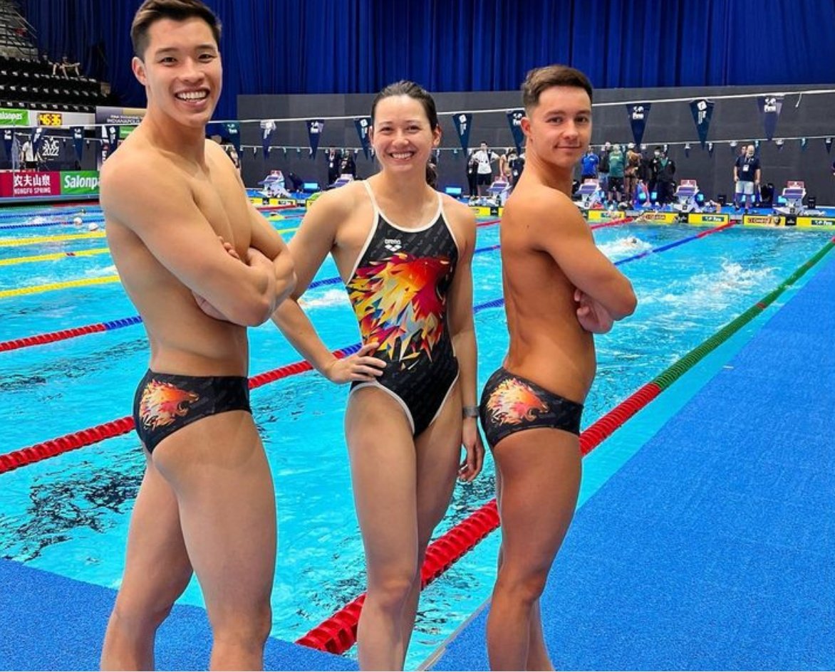 Siobhan Haughey, Ian Ho and Adam Chillingworth pose in swim suits designed by Haughey. Photo: Handout