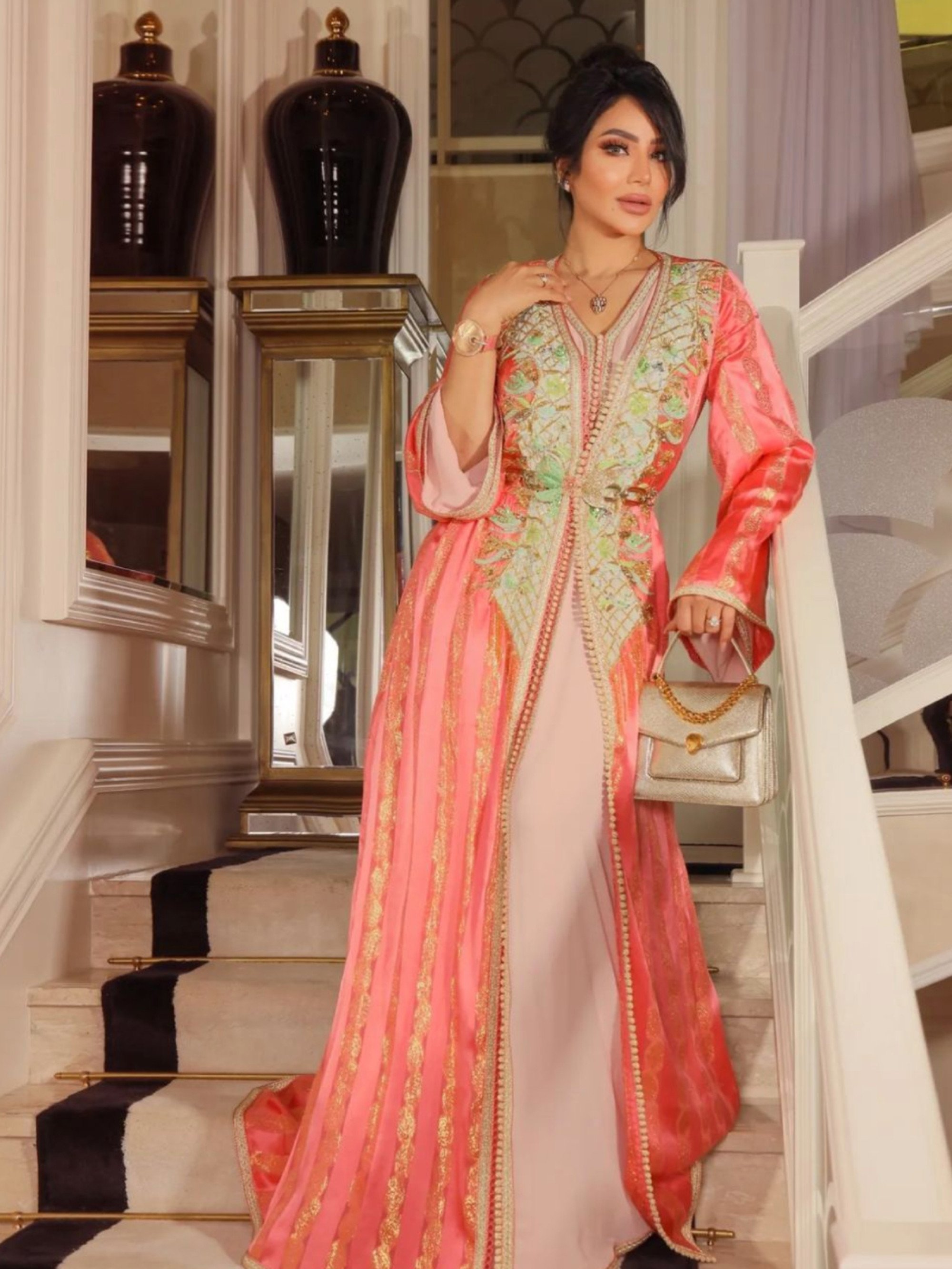 Lojain Omran’s Instagram often shows the TV star posing in lavish clothes. Photo: @lojain_omran/Instagram