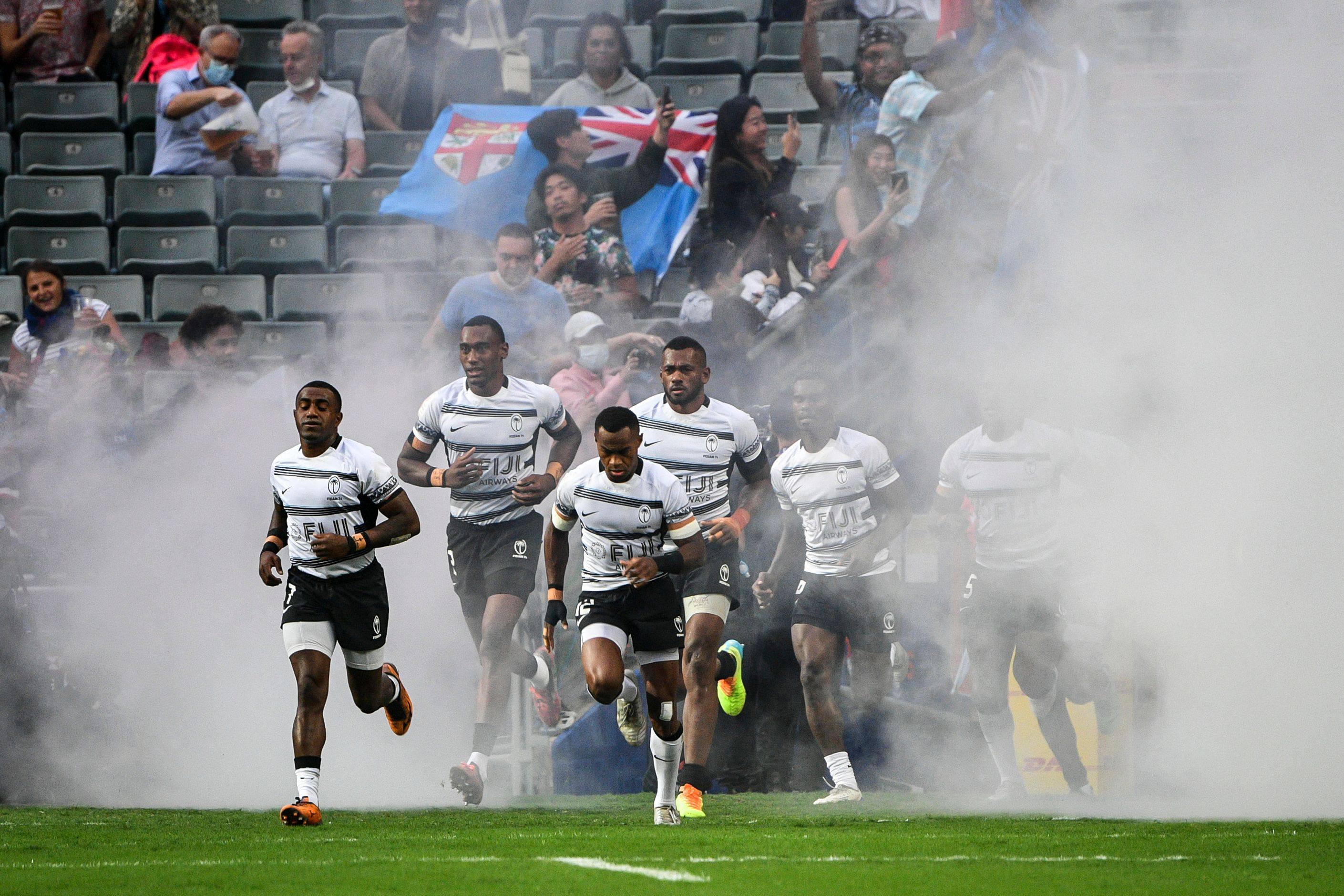 Fiji players run onto the field before playing Japan on the first day of the 2022 Hong Kong Sevens. Photo: AFP