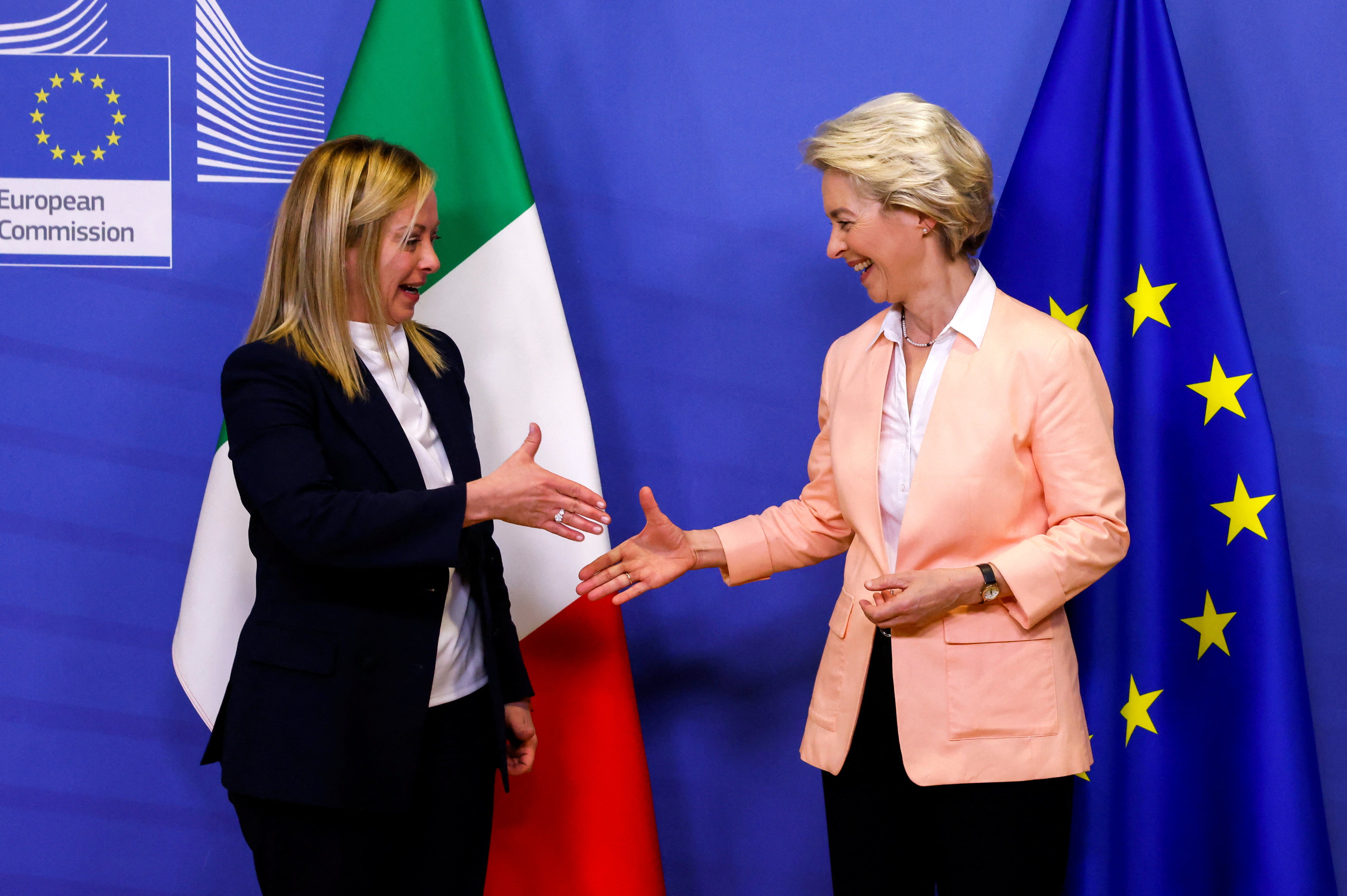 Italian Prime Minister Giorgia Meloni (left) and European Commission President Ursula von der Leyen shake hands at the EU Commission headquarters in Brussels on Thursday. Photo: Reuters