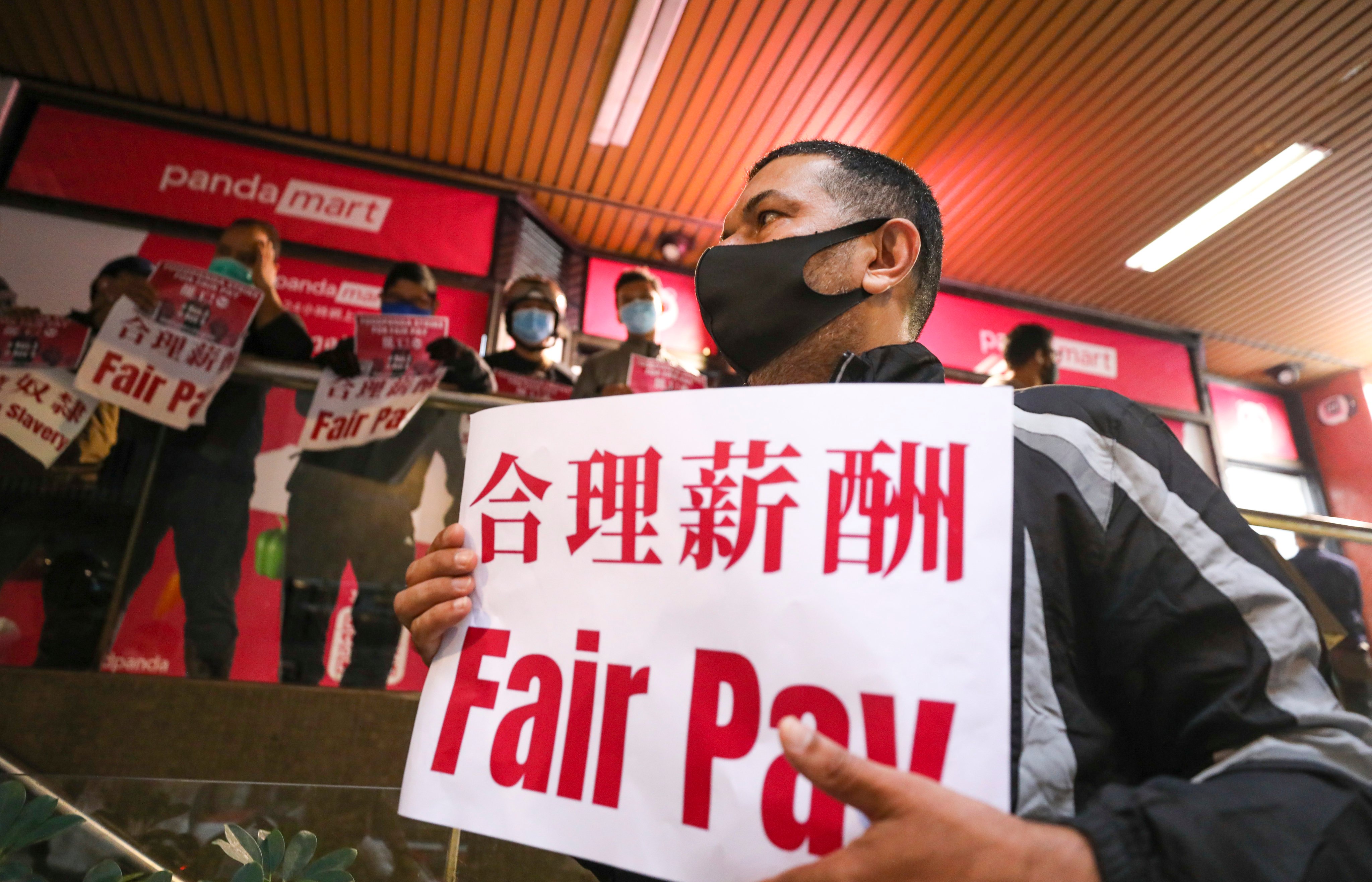 Foodpanda delivery workers demonstrate in Central in a dispute over pay rates. Photo: Xiaomei Chen