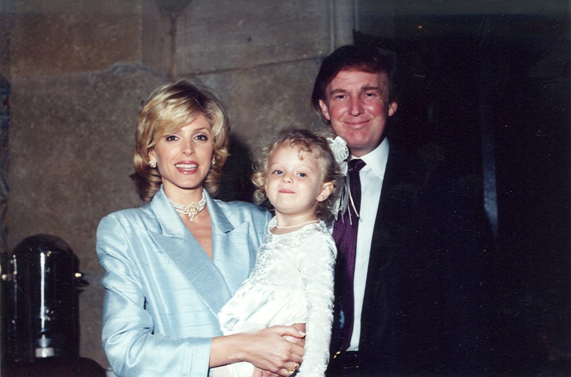 Marla Maples and her then husband, businessman Donald Trump, with their daughter Tiffany, as they pose together at the Mar-a-Lago estate, Palm Beach, Florida, in 1996. Photo: Getty Images