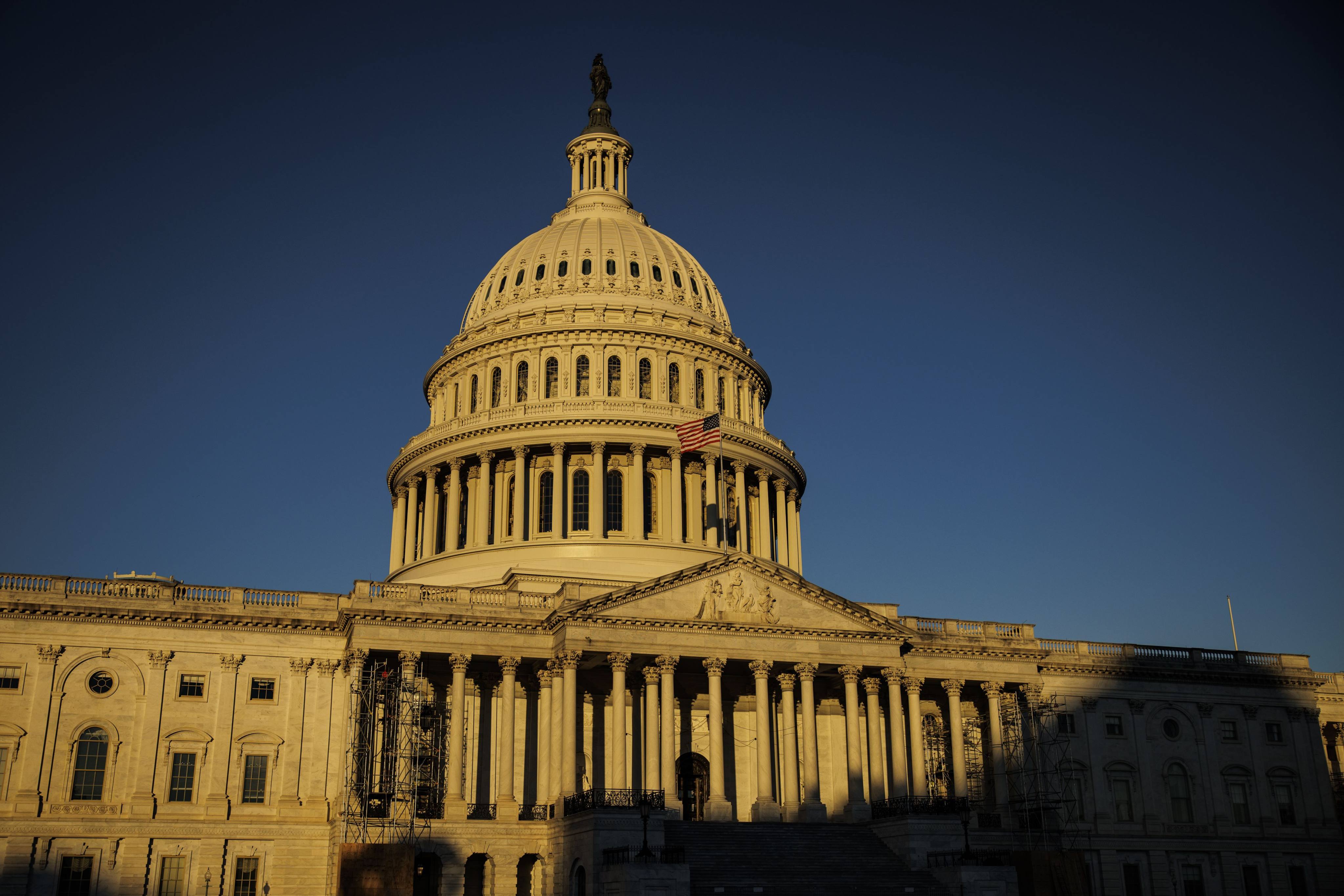 The rising sun creeps across the US Capitol building on Wednesday, the morning after Americans voted in the country’s midterm elections. Photo:  Getty Images/AFP