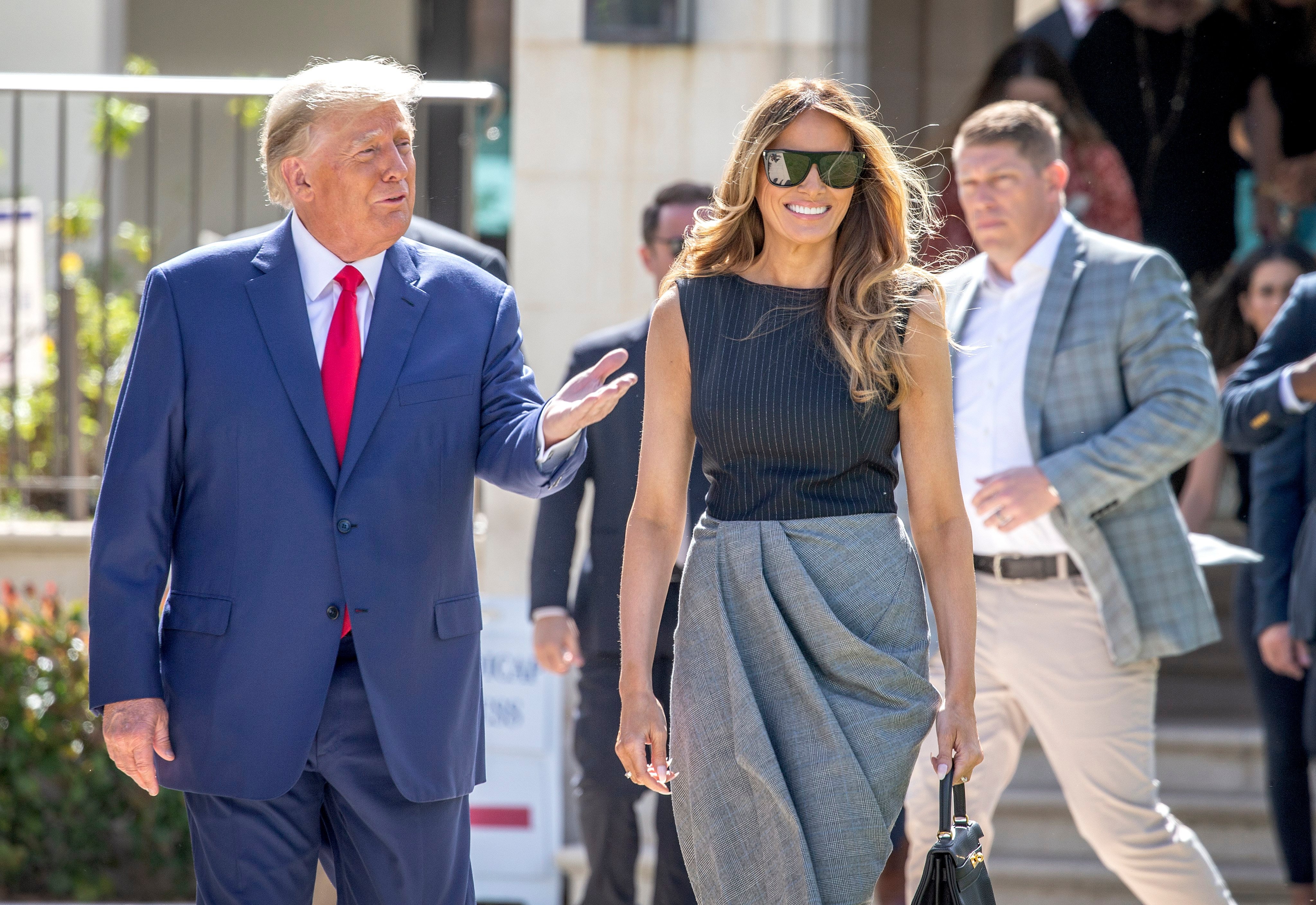 Former US President Donald Trump and former first lady Melania Trump, walk out of the electoral precinct after voting in person at the Morton and Barbara Mandel Recreation Center in Palm Beach, Florida, US, on October 8. Photo: EPA-EFE
