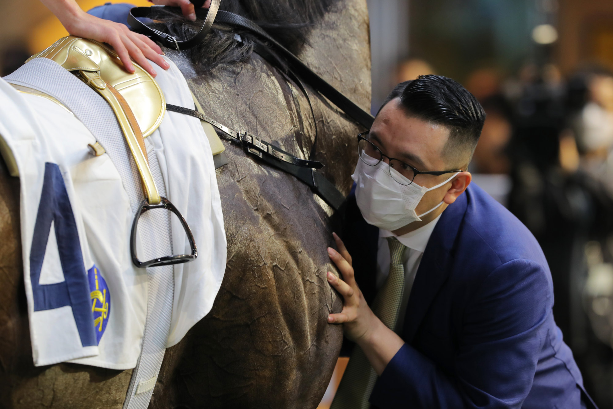 Pierre Ng gives Super Commander a hug after his win on Wednesday night.