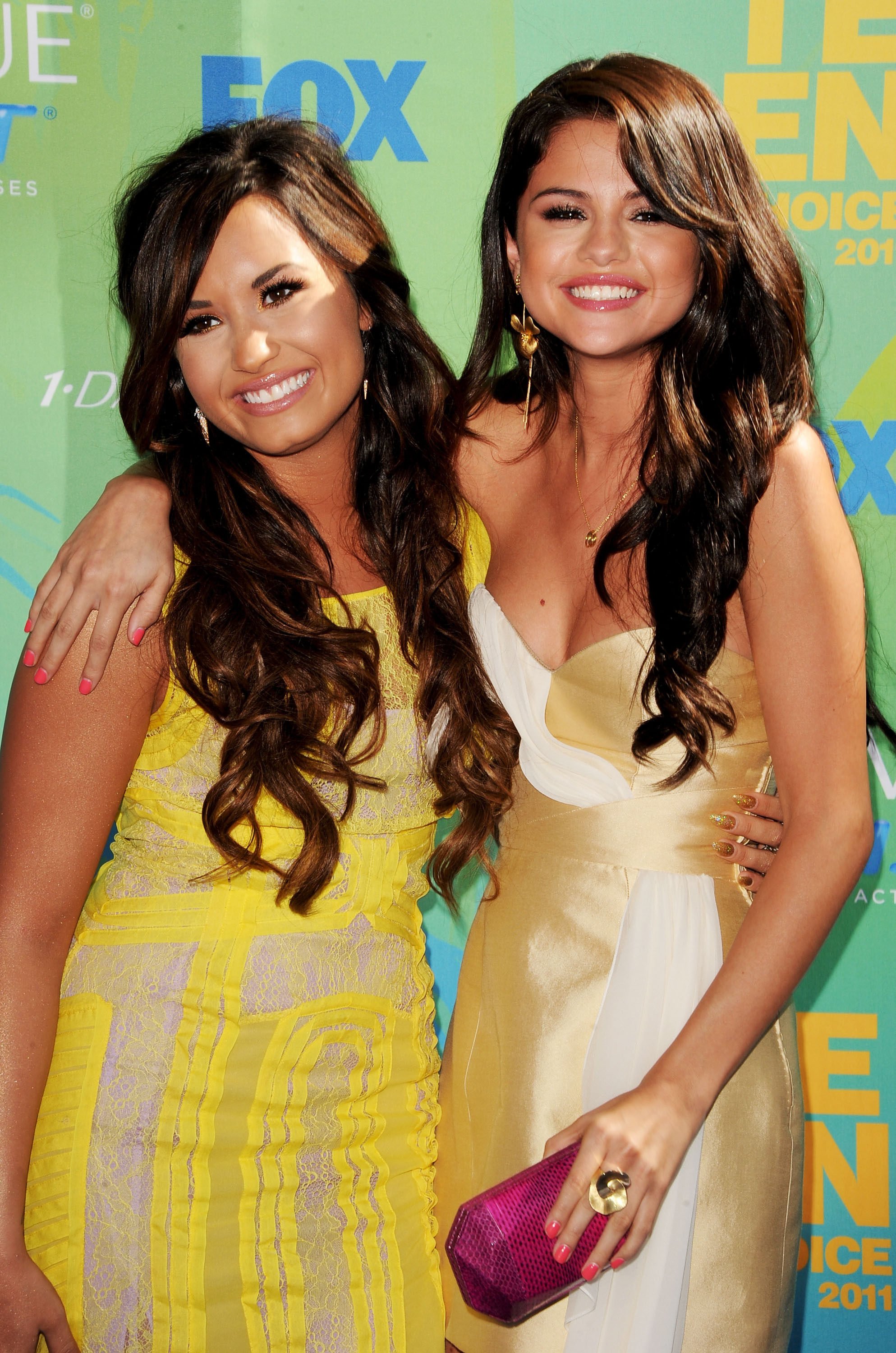 Singer/actresses Demi Lovato and Selena Gomez arrive at the Teen Choice Awards held at the Gibson Amphitheatre in August 2011, in Universal City, California. Photo: Getty Images