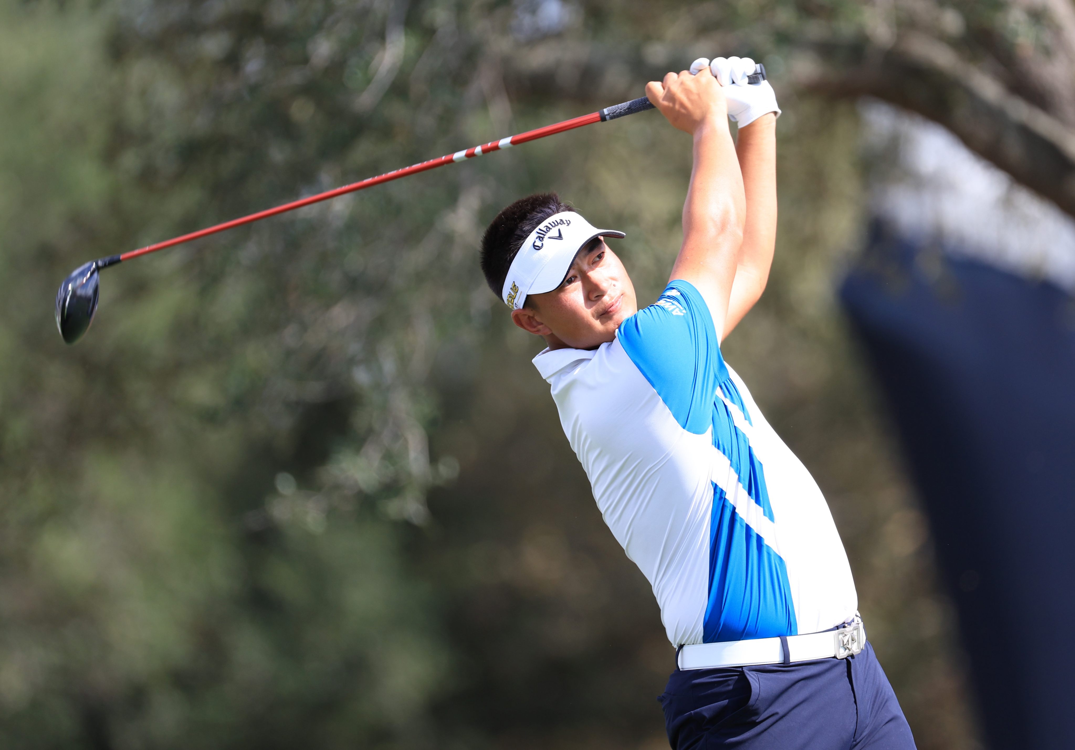 Carl Yuan tees off on the first at the start of his opening round at the Houston Open. Photo: AFP