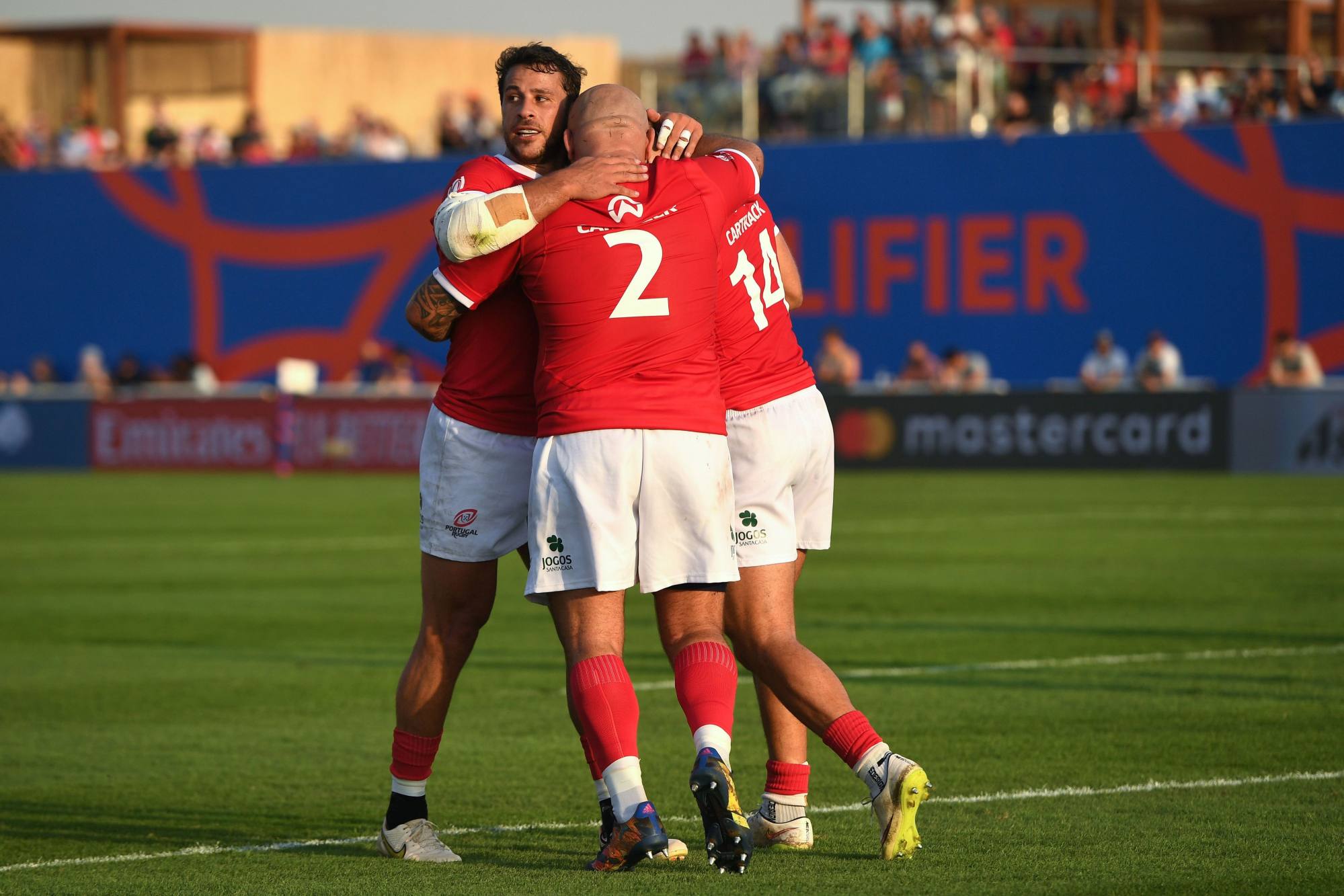 Portugal’s Vincent Pinto (right) celebrates scoring his team’s fifth try against Kenya. Photo: World Rugby