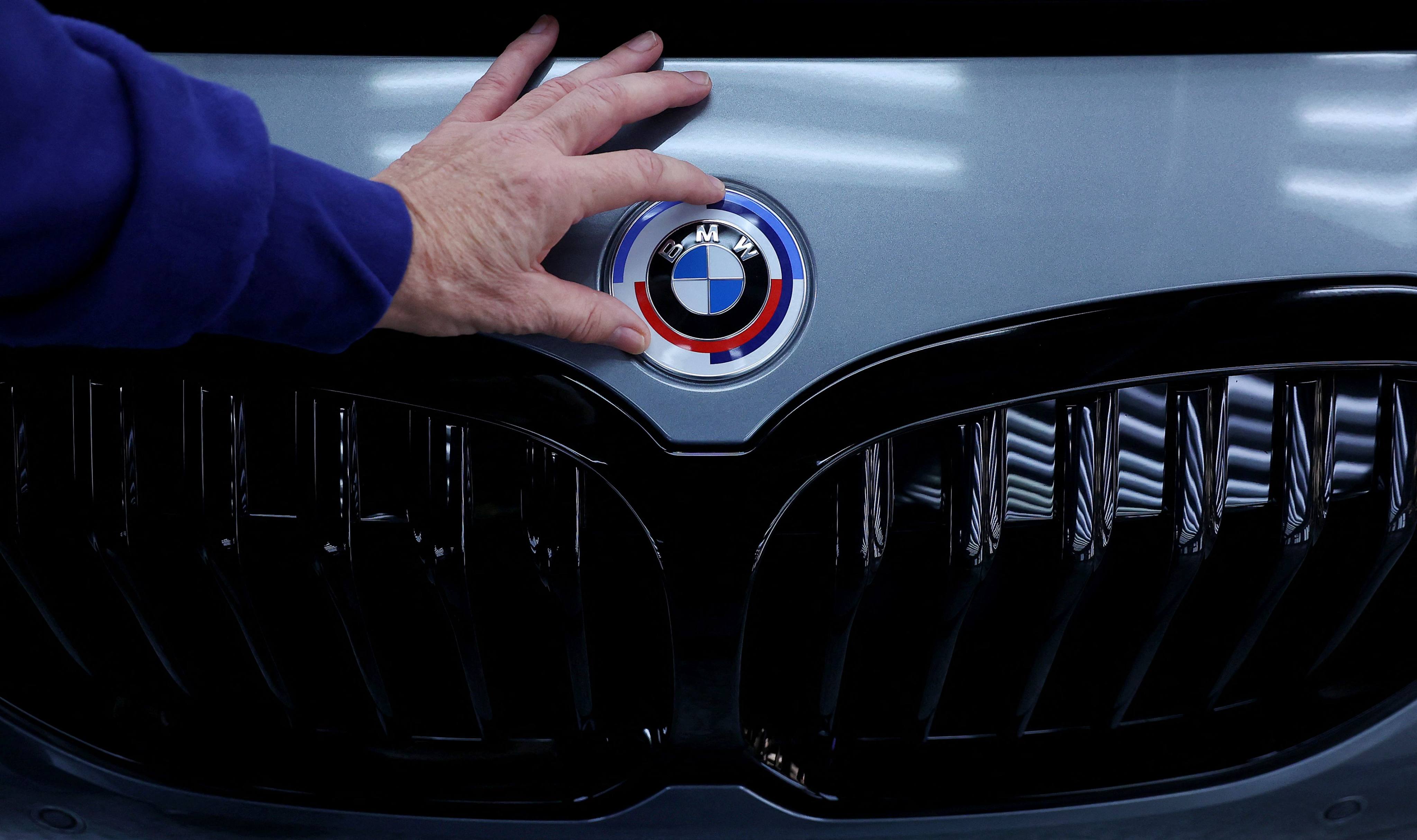 A car undergoes a final inspection at a BMW plant in Leipzig. Photo: AFP