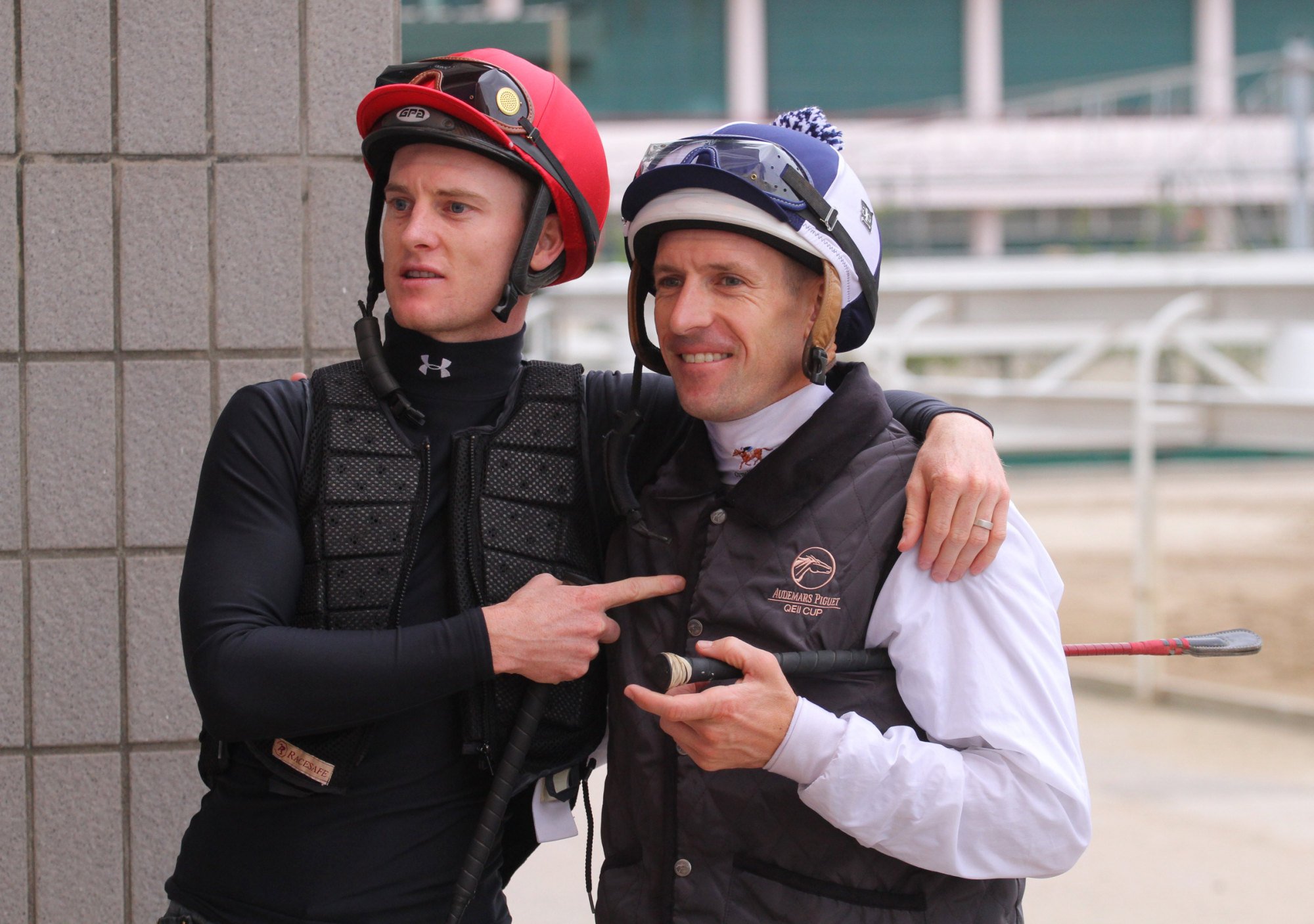 Australian jockeys Zac Purton and Hugh Bowman at Sha Tin trackwork in April 2014.