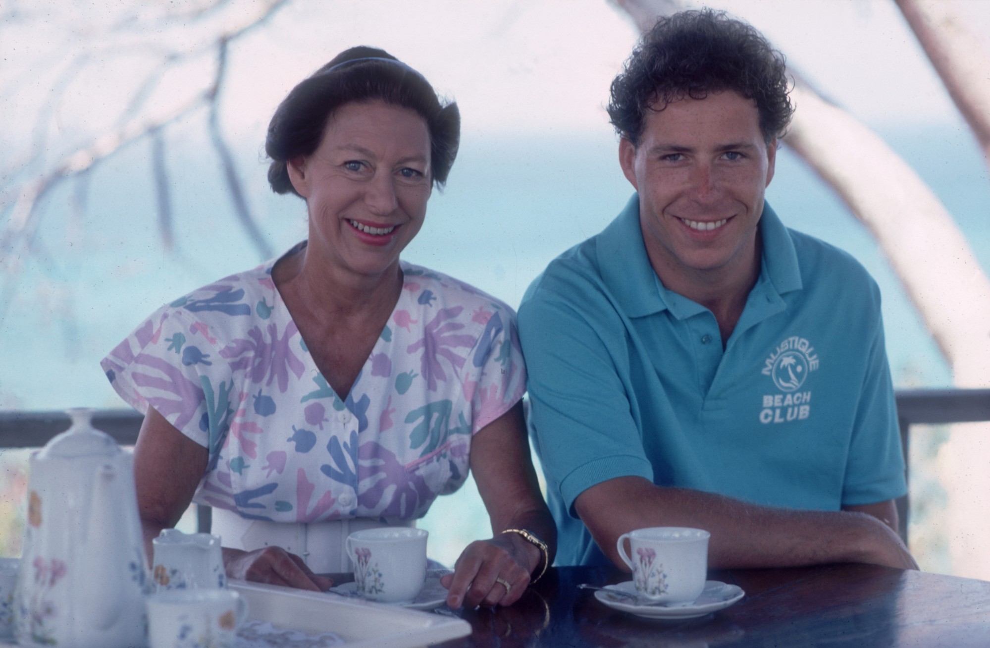 Princess Margaret with her son David Linley on the island of Mustique in the Grenadines, in 1989. Photo: Getty Images