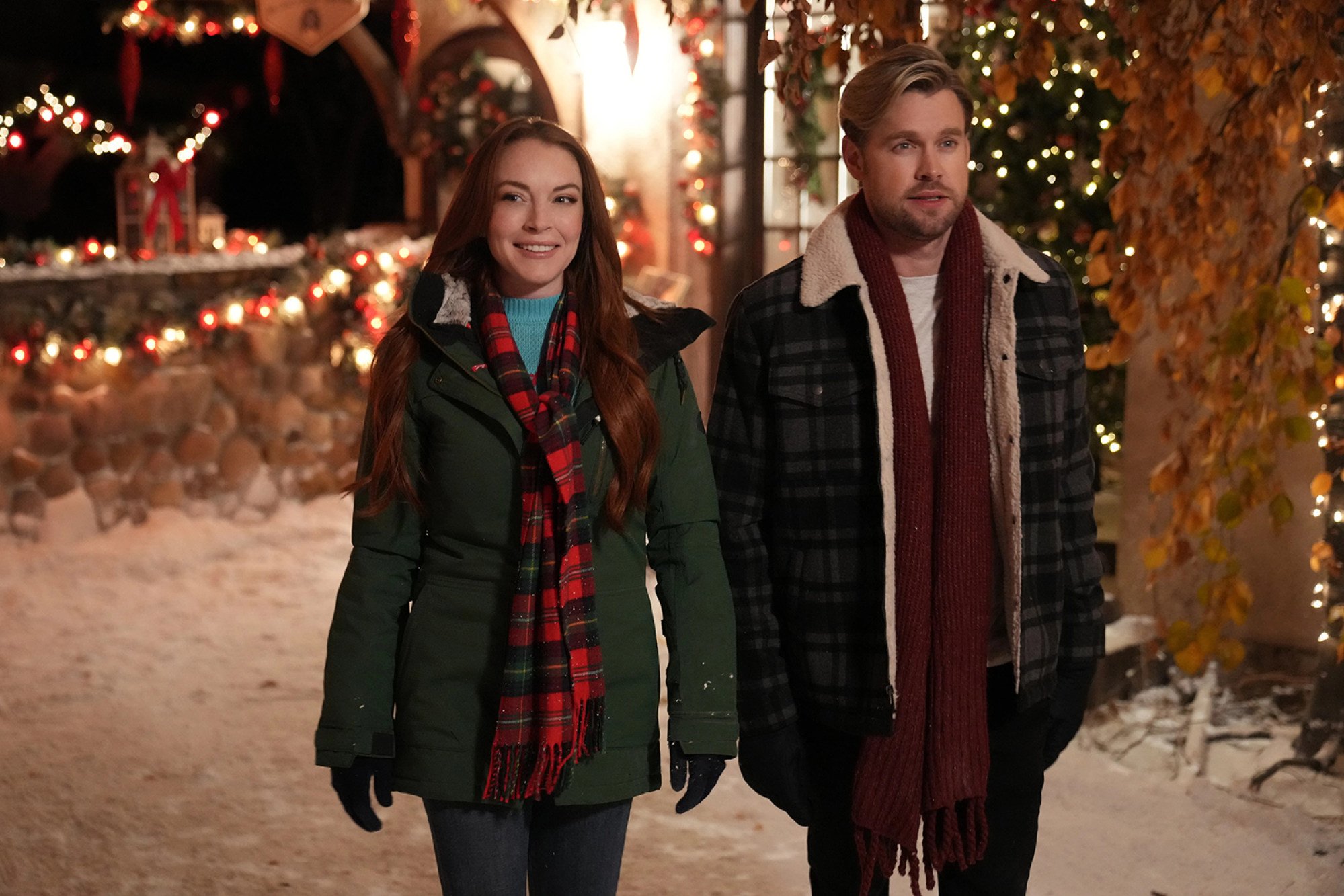 Lindsay Lohan, left, and Chord Overstreet in Falling for Christmas. Photo: Netflix