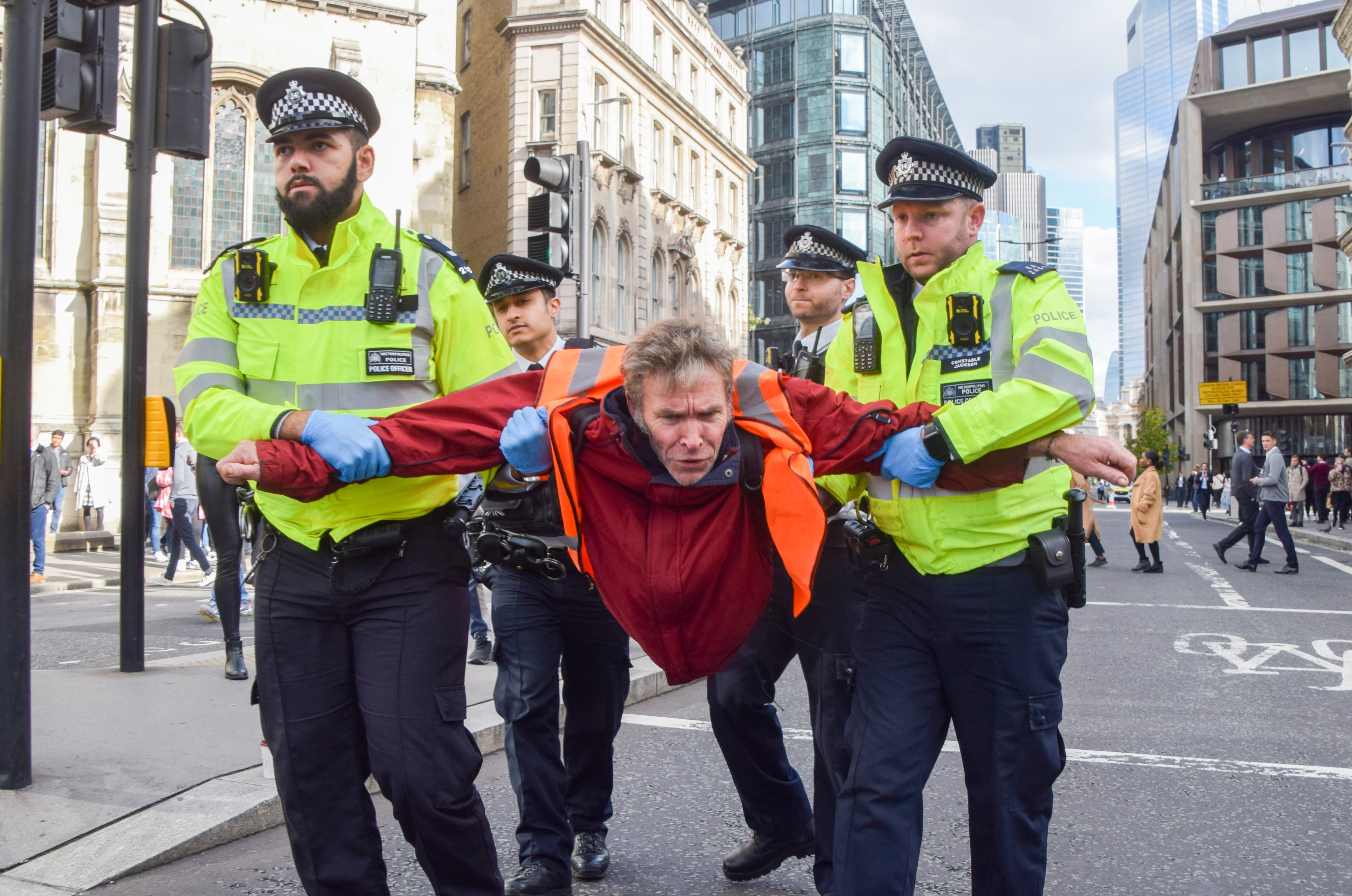 Police arrest a protester during a protest in October by Just Stop Oil activists in London. Photo: dpa