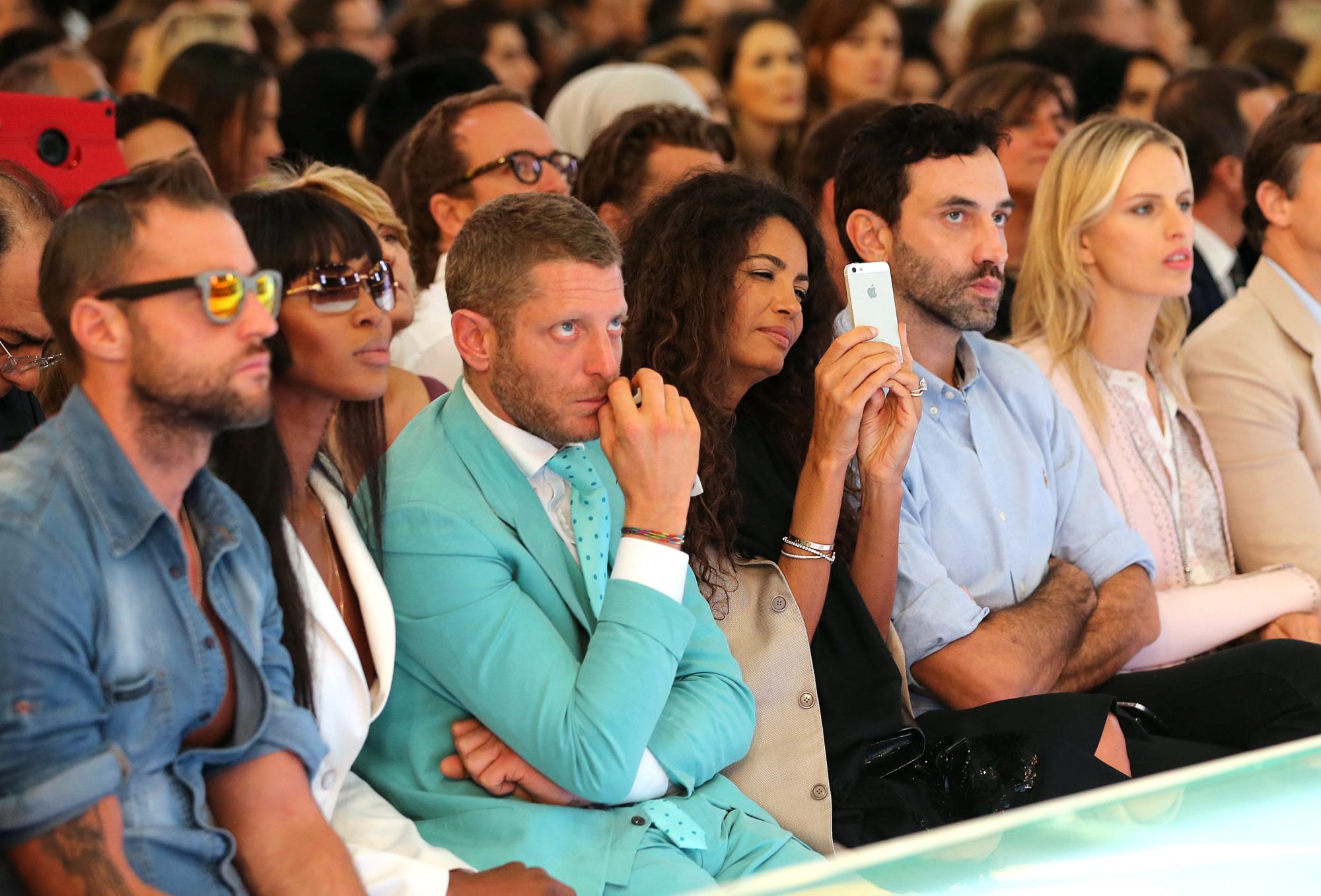 Riccardo Tisci (second from the right) introduced the TB monogram at Burberry, which helped increase its appeal among Gen Z customers. Photo: EPA