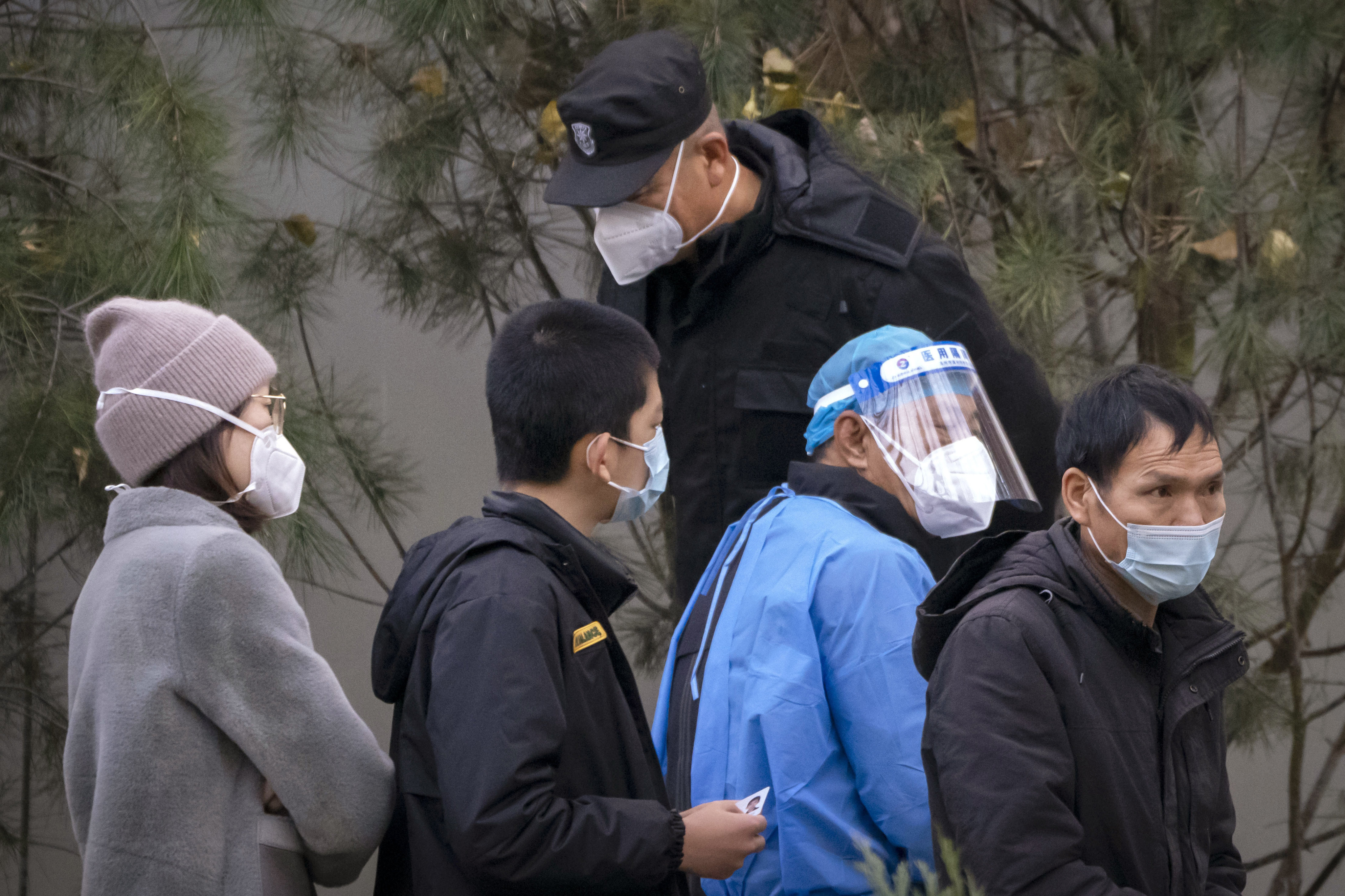 Local authorities are racing to contain new Covid-19 outbreaks in China, but under recently relaxed rules, they have been instructed to refrain from using harsher restrictions. Photo: AP