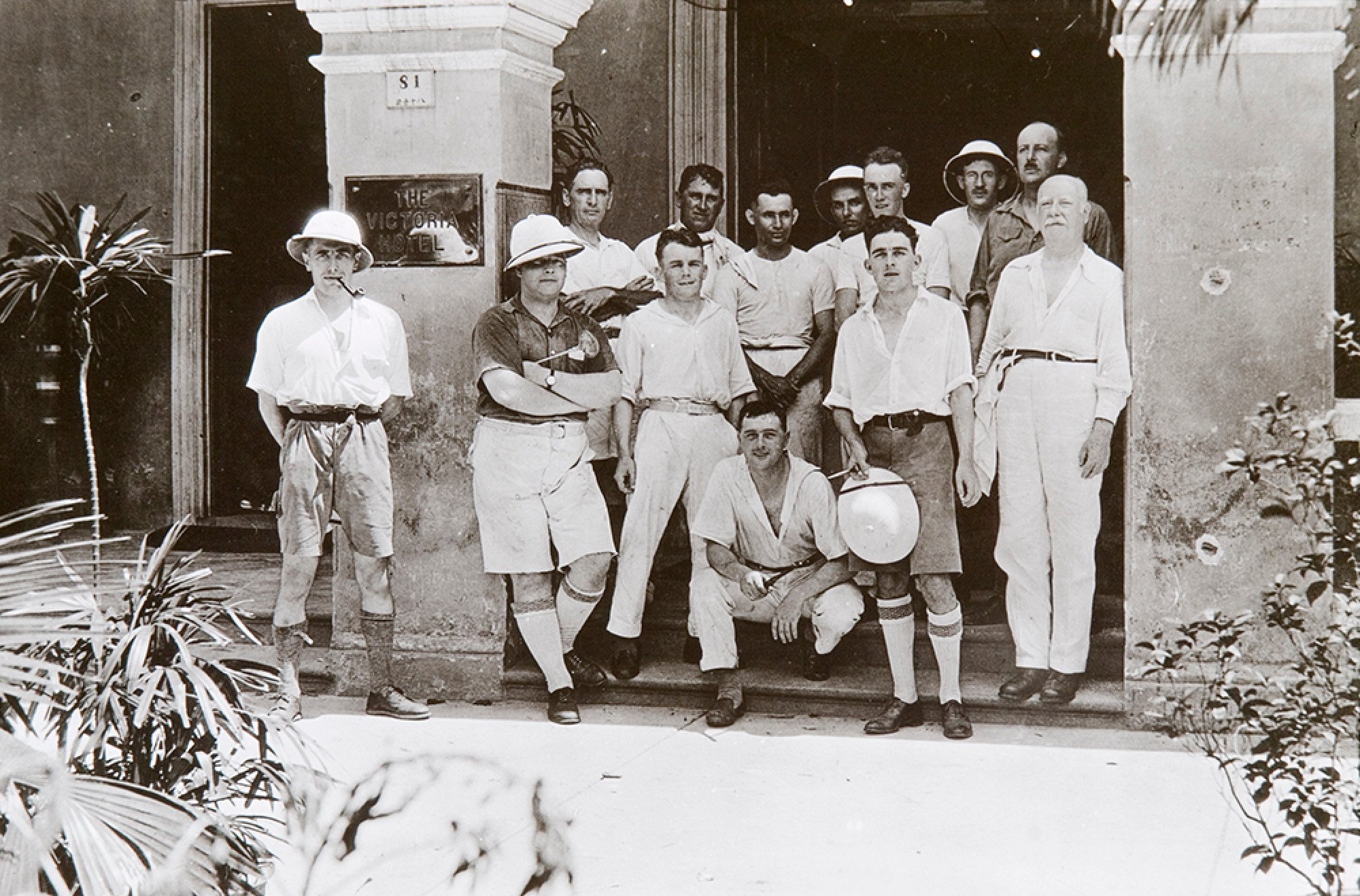 People gather outside the Victoria Hotel in June 1925.