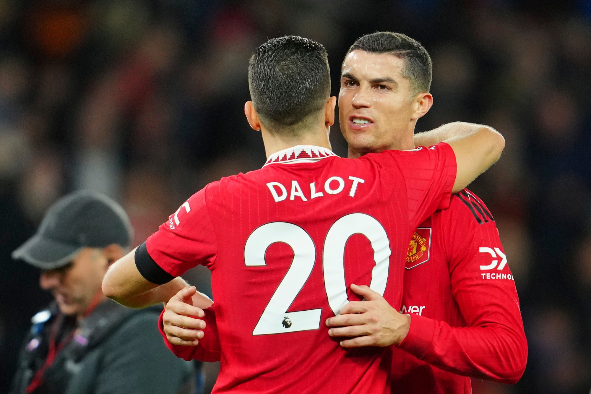 Manchester United’s Diogo Dalot hugs Cristiano Ronaldo after a victory over West Ham. Photo: AP