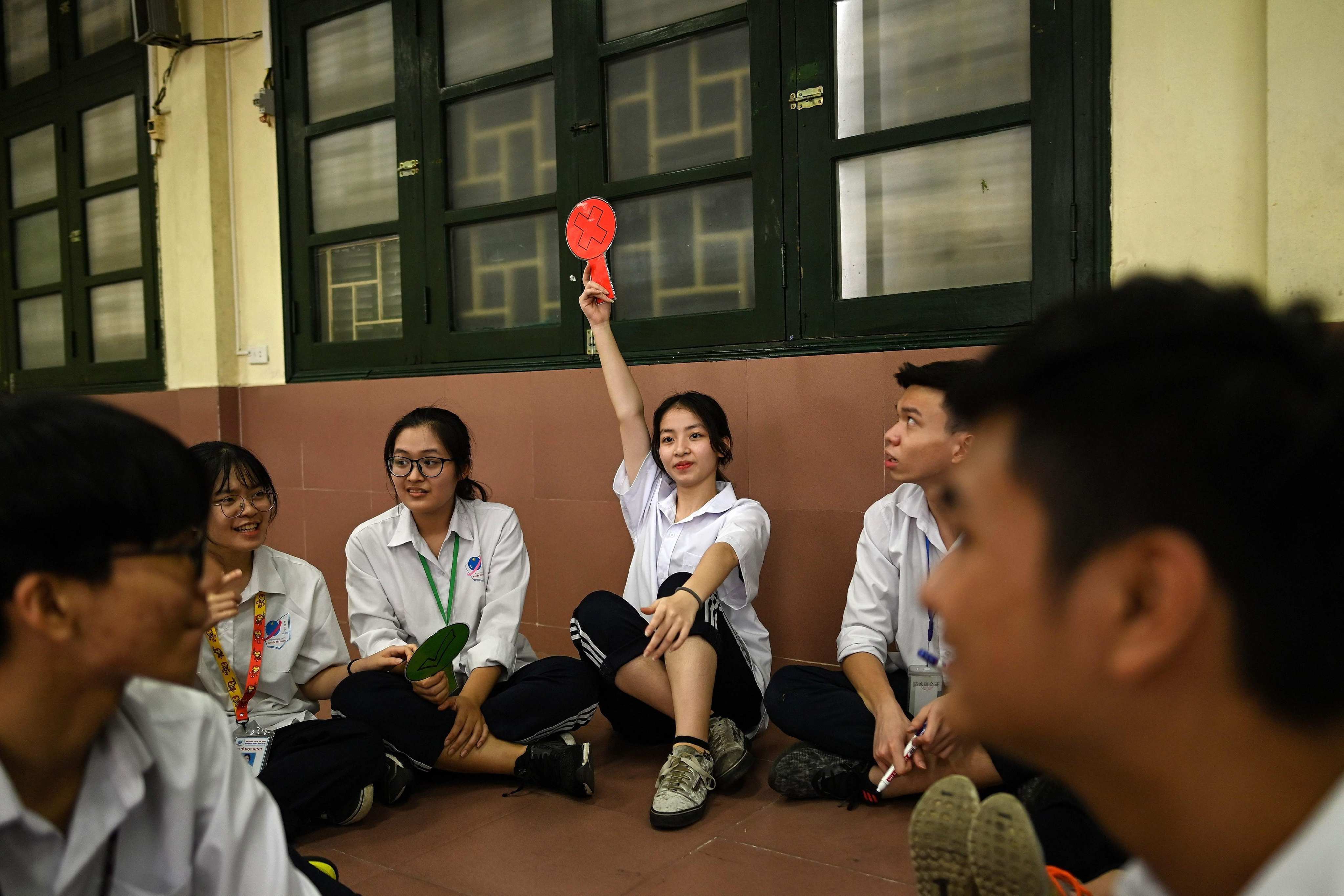 Students at the Nguyen Tat Thanh High School in Hanoi, Vietnam on May 26, 2020. Vietnam, India and Malaysia are among those most likely to benefit from the demographic dividend. Photo: AFP