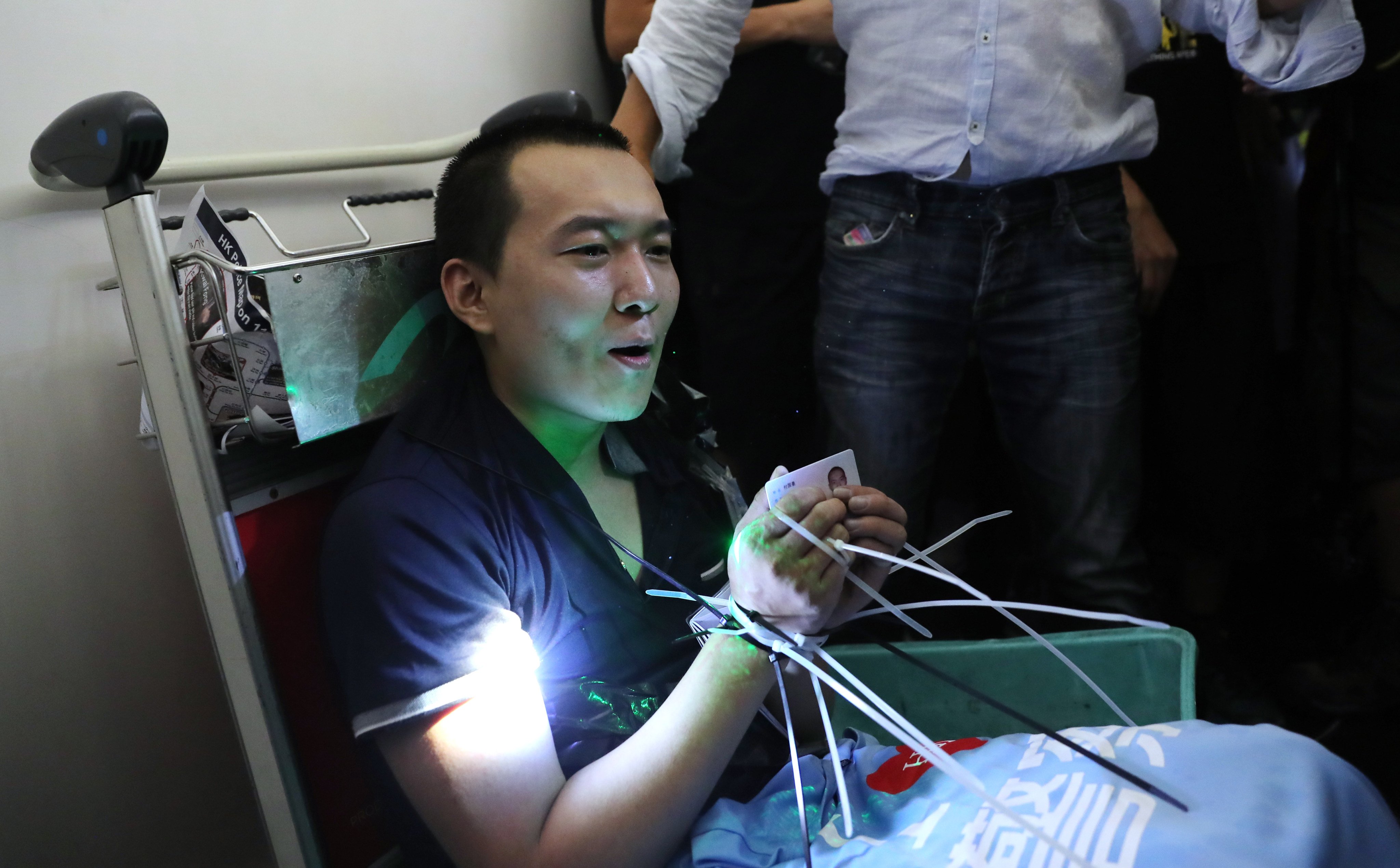 Global Times journalist Fu Guohao, was tied up by anti-government protesters at Hong Kong International Airport on August 13, 2019. He was suspected of being an undercover agent from the mainland. Three protesters were convicted of rioting and other charges. Photo: Sam Tsang