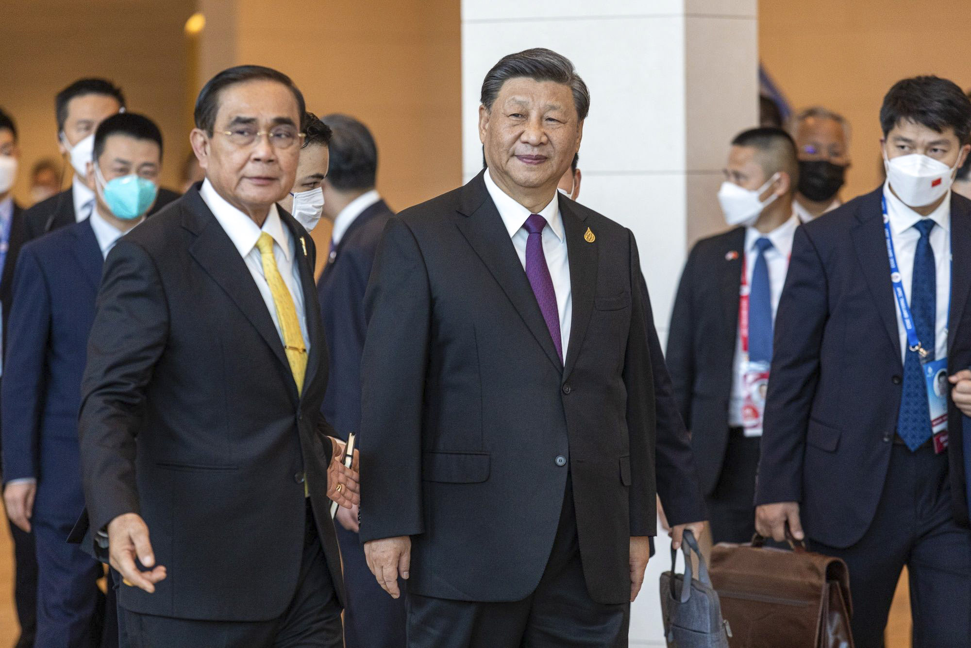 Thai Prime Minister Prayuth Chan-ocha and Chinese President Xi Jinping arrive at the Asia-Pacific Economic Cooperation summit in Bangkok on Friday. Photo: Bloomberg