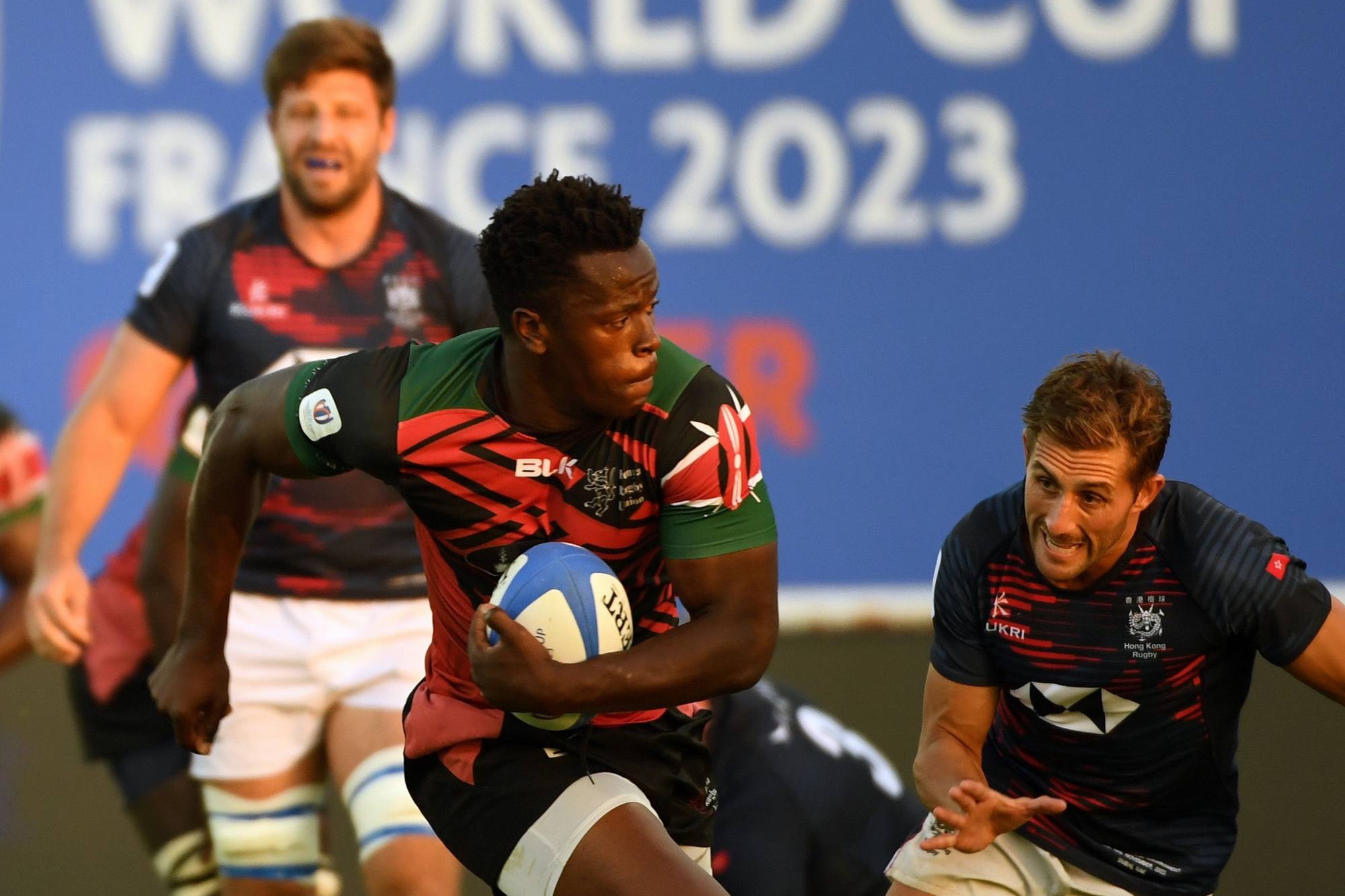 John Okoth of Kenya breaks clear to score his team’s first try of the game. Photo: World Rugby via Getty Images